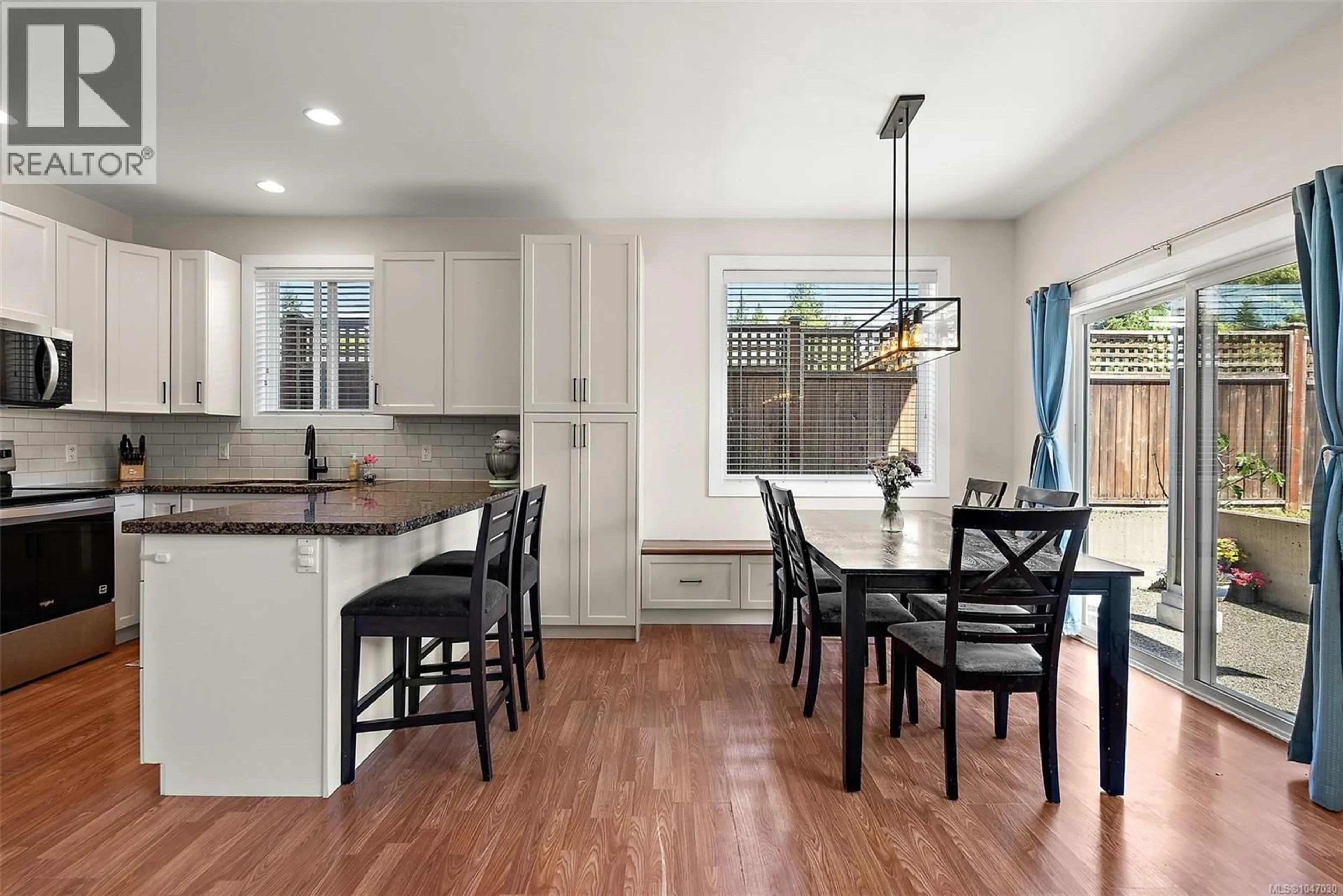 Open concept kitchen, wood/laminate floor for A - 2167 PYRITE DRIVE, Sooke British Columbia V9Z0L8