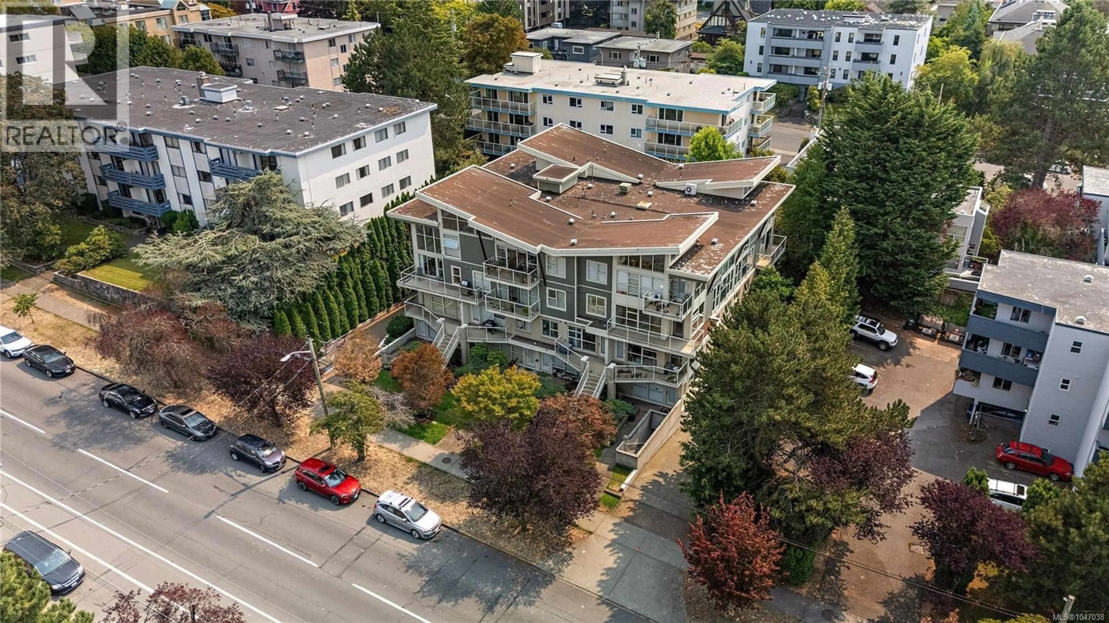 A pic from outside/outdoor area/front of a property/back of a property/a pic from drone, city buildings view from balcony for 207 - 1155 YATES STREET, Victoria British Columbia V8V3N1