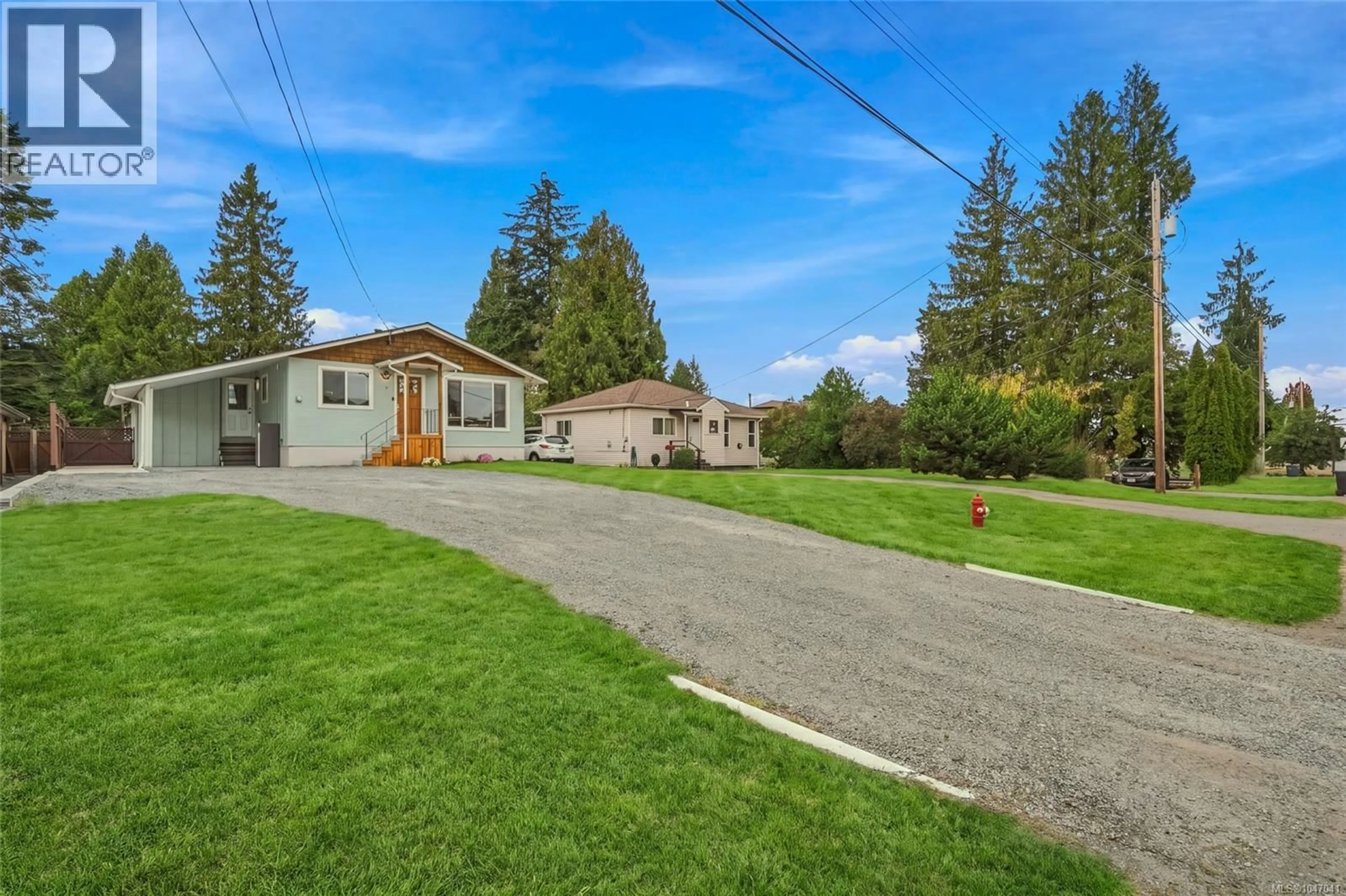 A pic from outside/outdoor area/front of a property/back of a property/a pic from drone, street for 219 MCVICKERS STREET, Parksville British Columbia V9P0B9