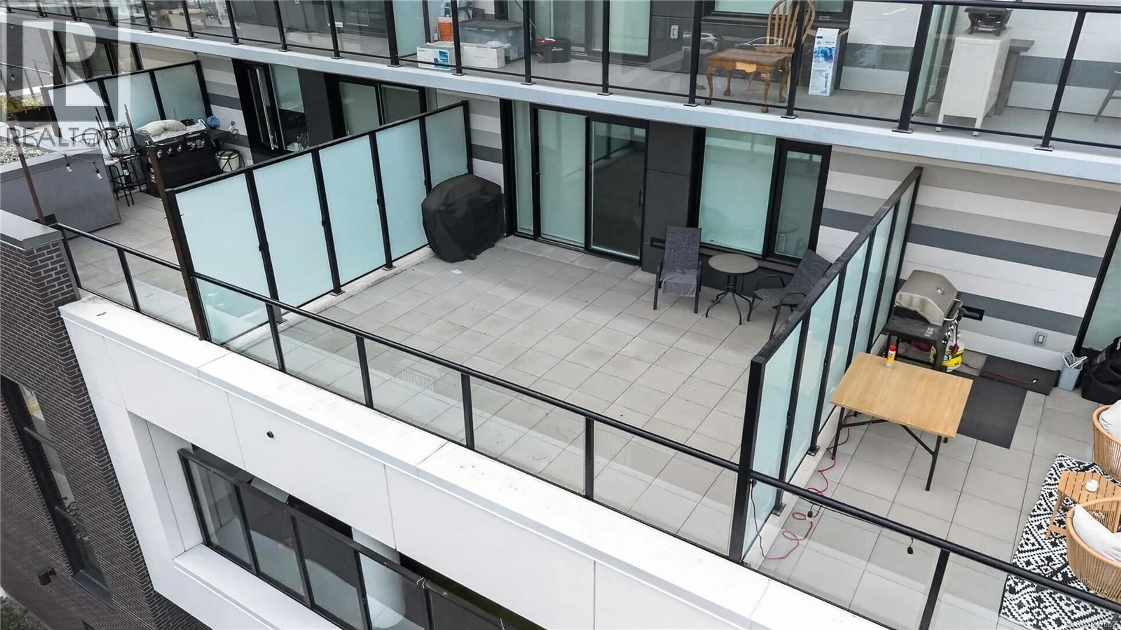 Patio, city buildings view from balcony for 303 - 1100 YATES STREET, Victoria British Columbia V8V3M8