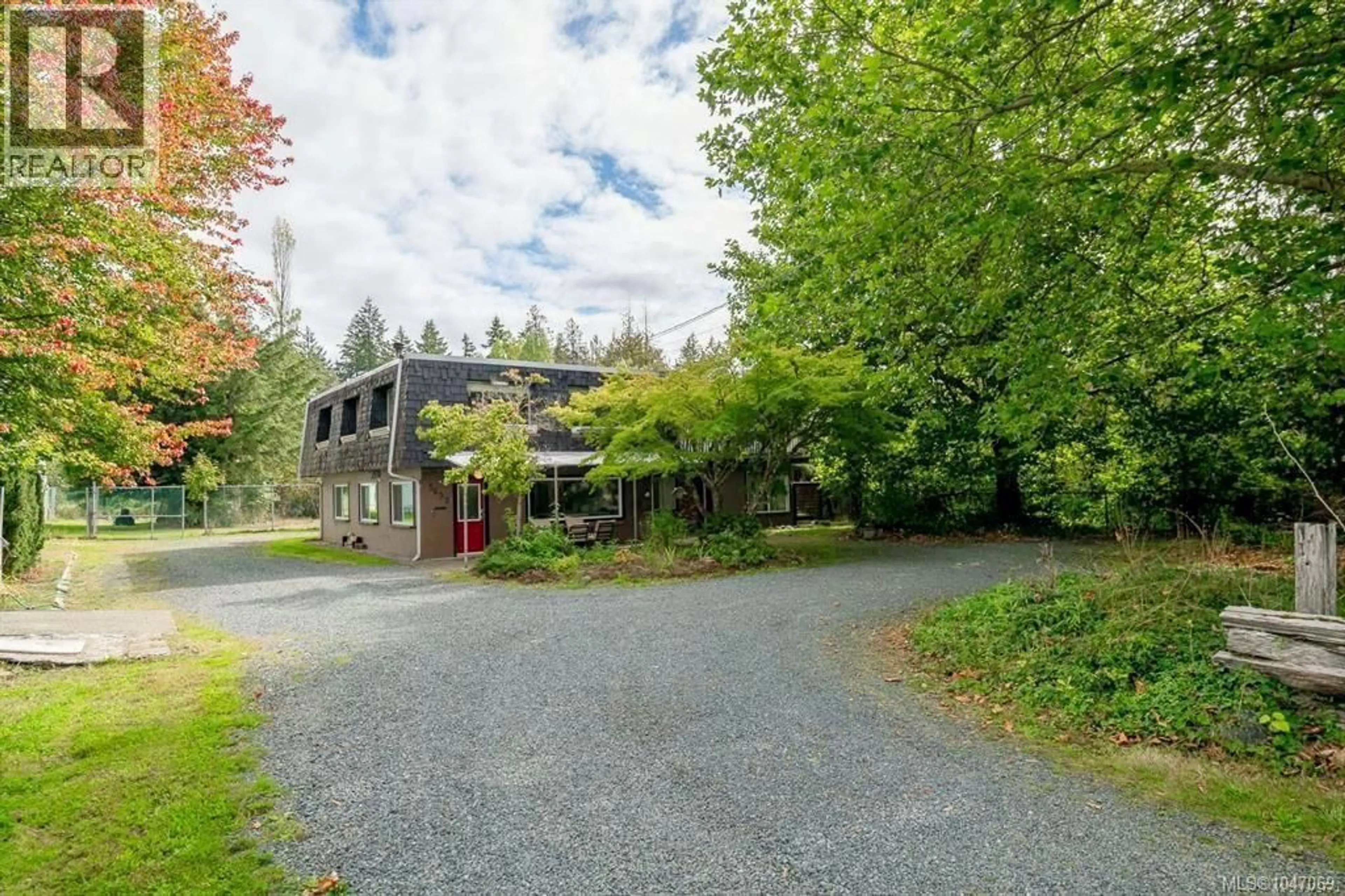 A pic from outside/outdoor area/front of a property/back of a property/a pic from drone, street for 5633 STRICK ROAD, Port Alberni British Columbia V9Y7L5