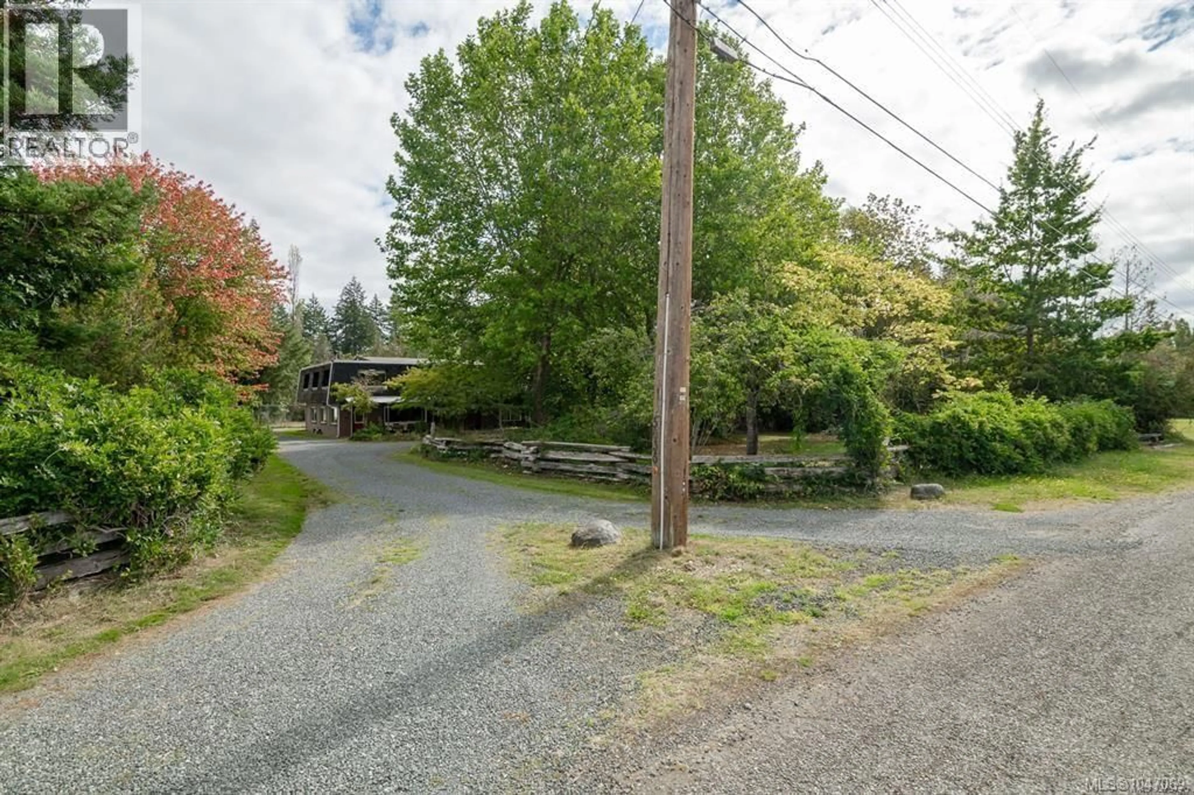 A pic from outside/outdoor area/front of a property/back of a property/a pic from drone, street for 5633 STRICK ROAD, Port Alberni British Columbia V9Y7L5