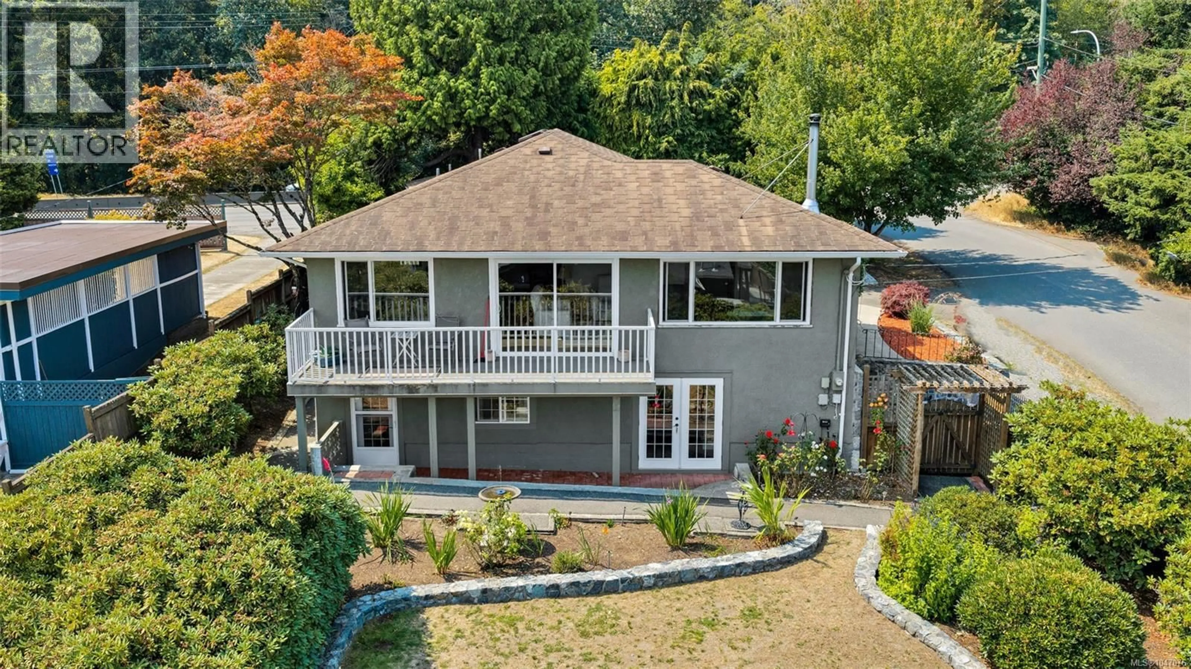A pic from outside/outdoor area/front of a property/back of a property/a pic from drone, unknown for 711 WELLS ROAD, Saanich British Columbia V8Y1R6
