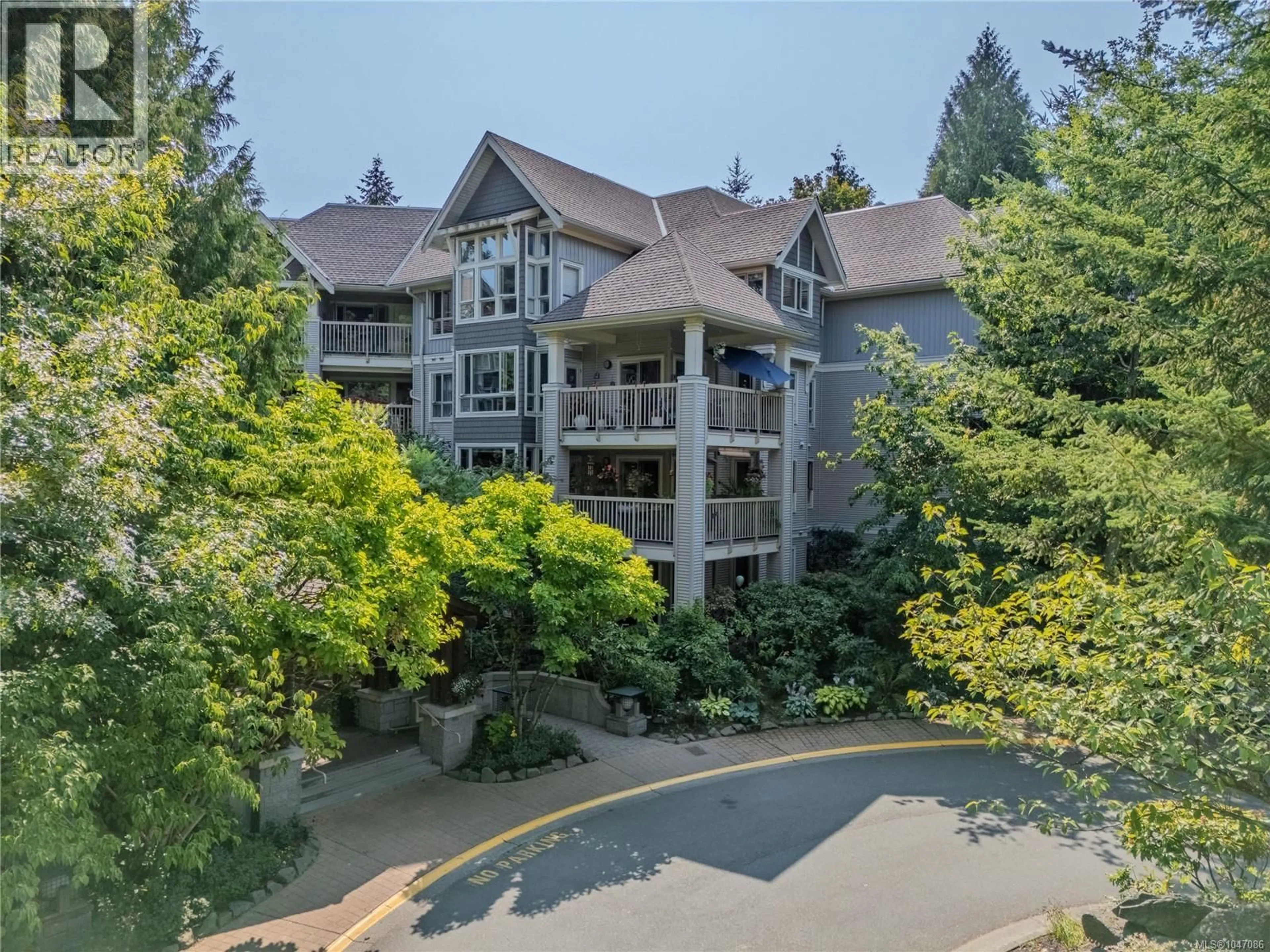 A pic from outside/outdoor area/front of a property/back of a property/a pic from drone, unknown for 404 - 5670 EDGEWATER LANE, Nanaimo British Columbia V9T6K1