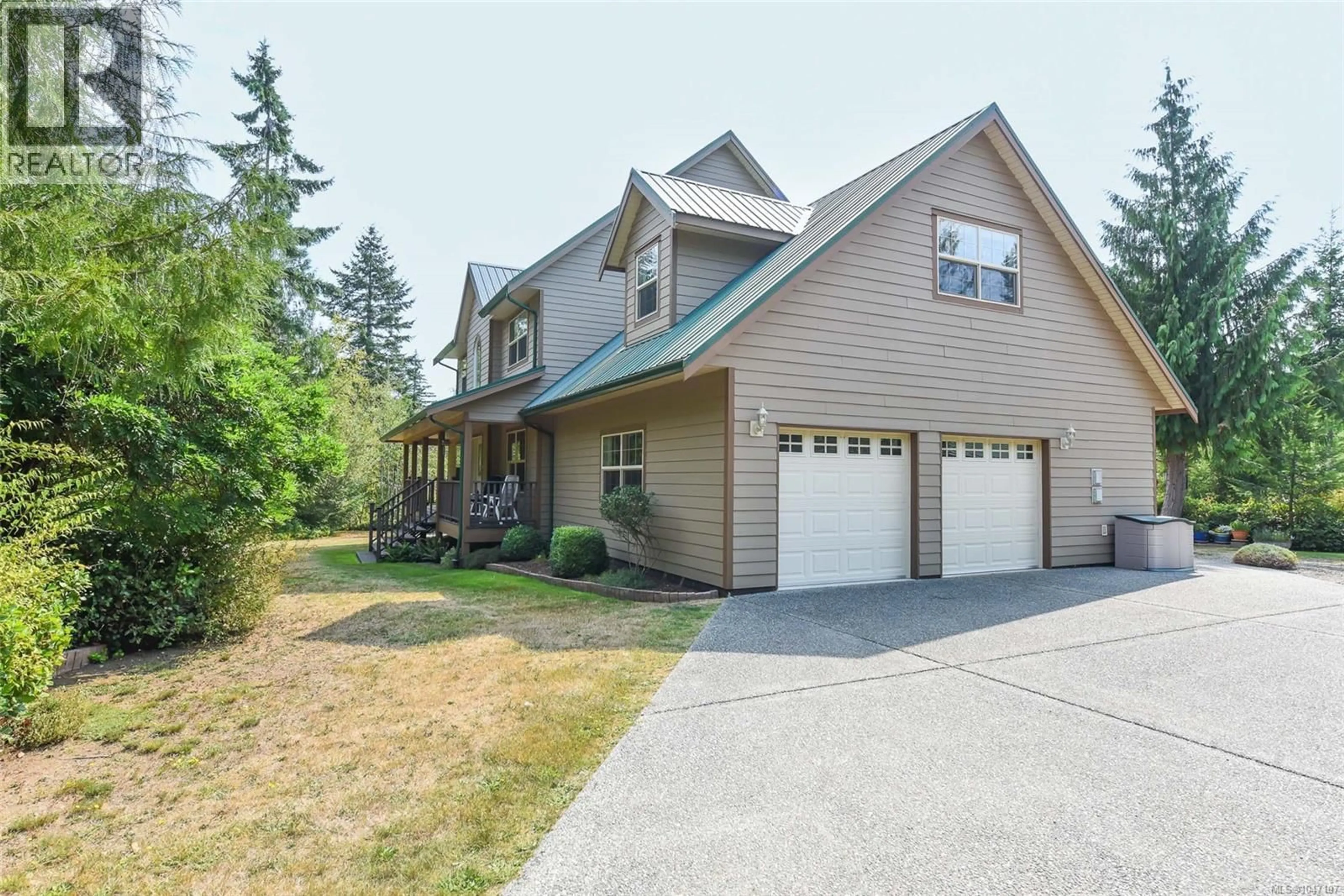 Home with vinyl exterior material, street for 1131 HECKER ROAD, Merville British Columbia V0R2M0