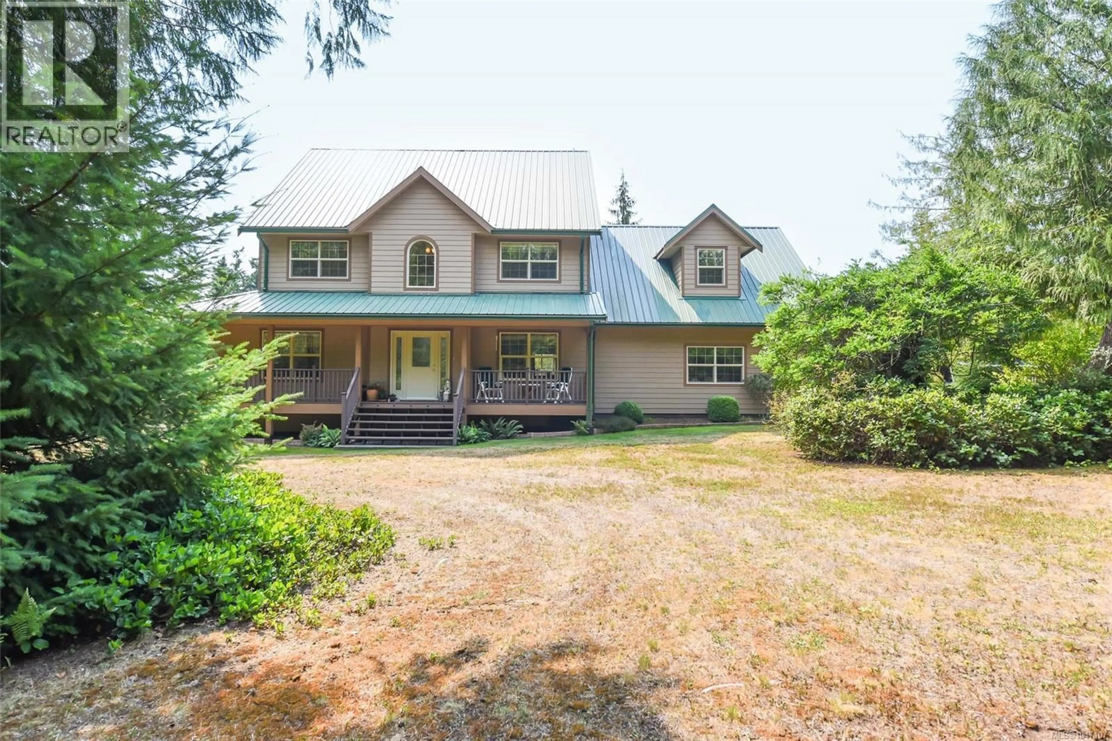 A pic from outside/outdoor area/front of a property/back of a property/a pic from drone, unknown for 1131 HECKER ROAD, Merville British Columbia V0R2M0