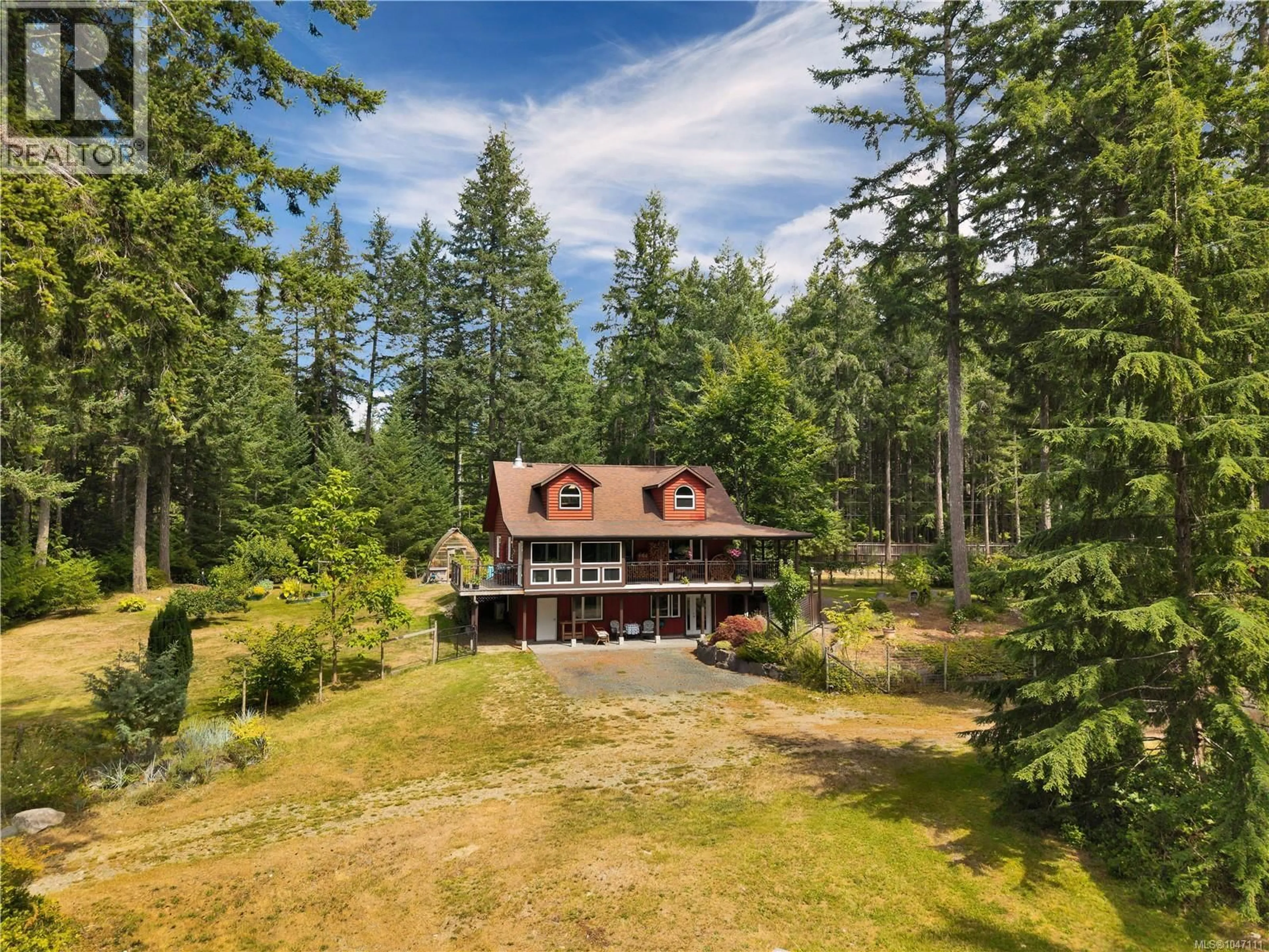 A pic from outside/outdoor area/front of a property/back of a property/a pic from drone, forest/trees view for 799 SMITHS ROAD, Quadra Island British Columbia V0P1N0