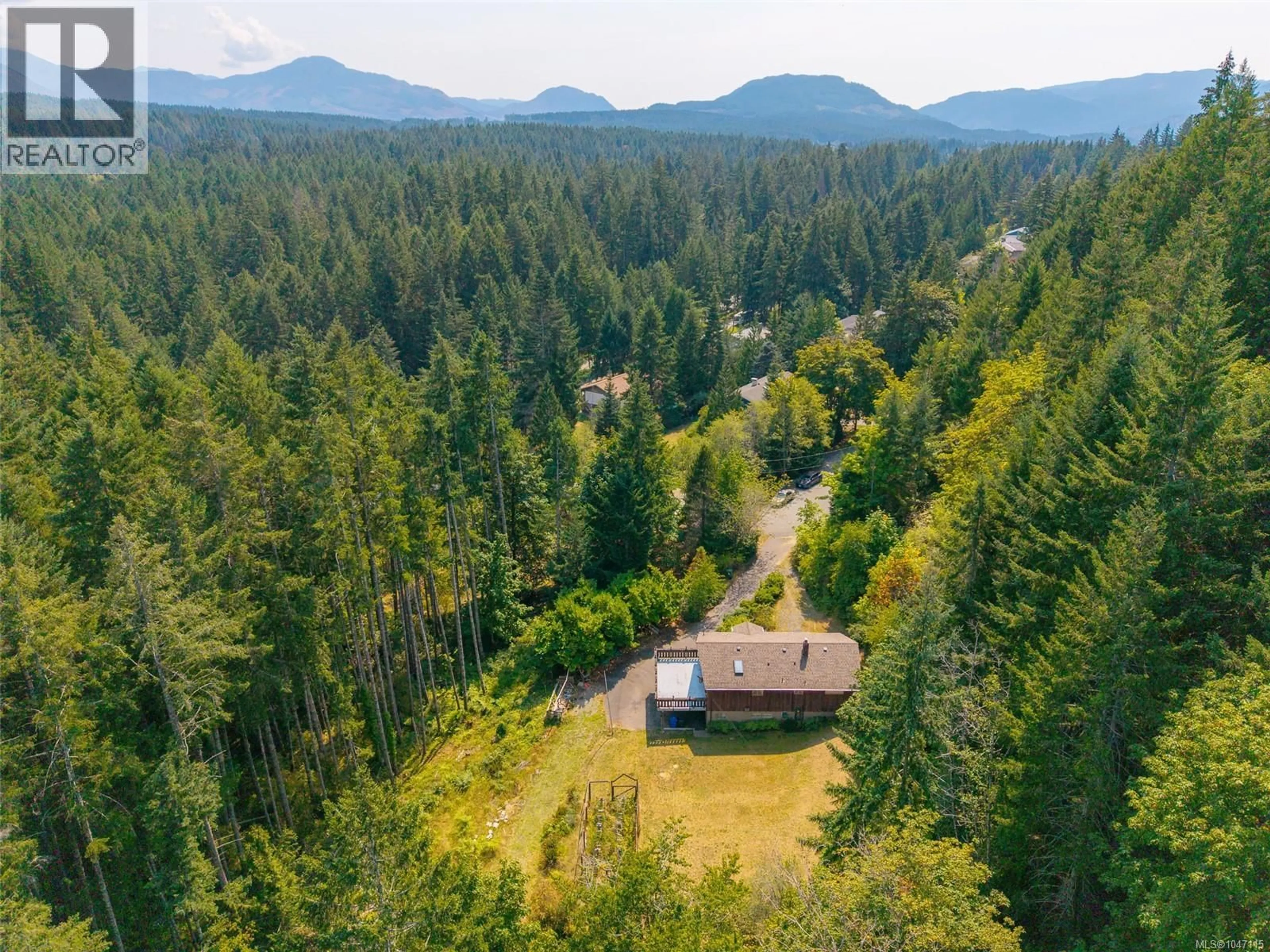 A pic from outside/outdoor area/front of a property/back of a property/a pic from drone, forest/trees view for 4581 WELLINGTON AVENUE, Port Alberni British Columbia V9Y7L4