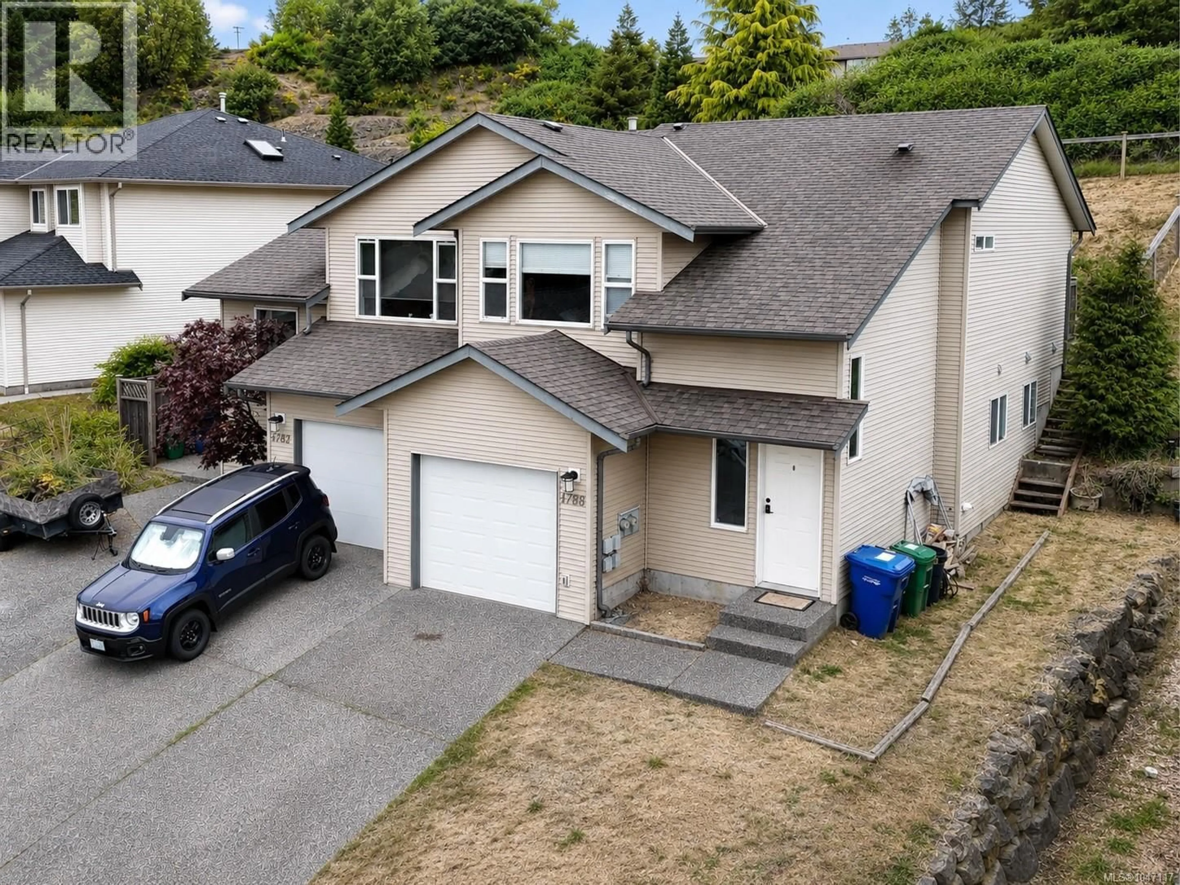 A pic from outside/outdoor area/front of a property/back of a property/a pic from drone, street for 4780 FAIRBROOK CRESCENT, Nanaimo British Columbia V9T6M6