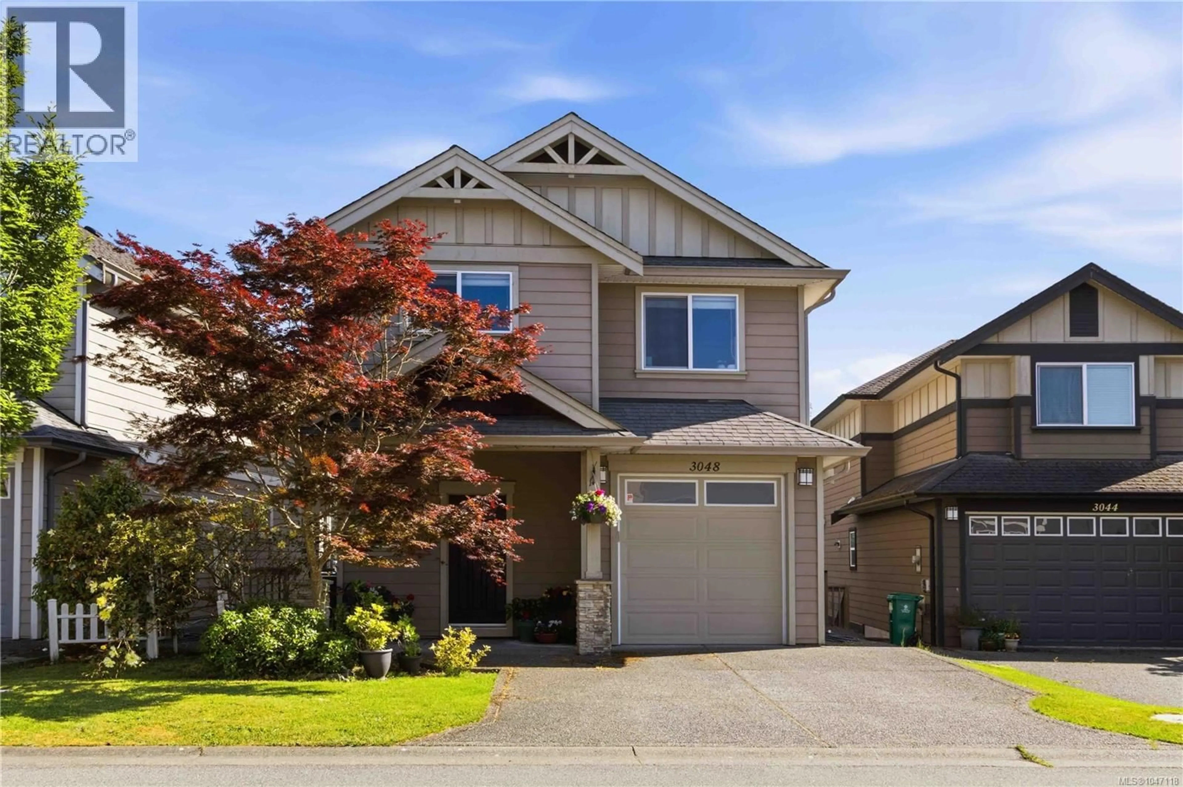 Home with vinyl exterior material, street for 3048 DORNIER ROAD, Langford British Columbia V9B0N2