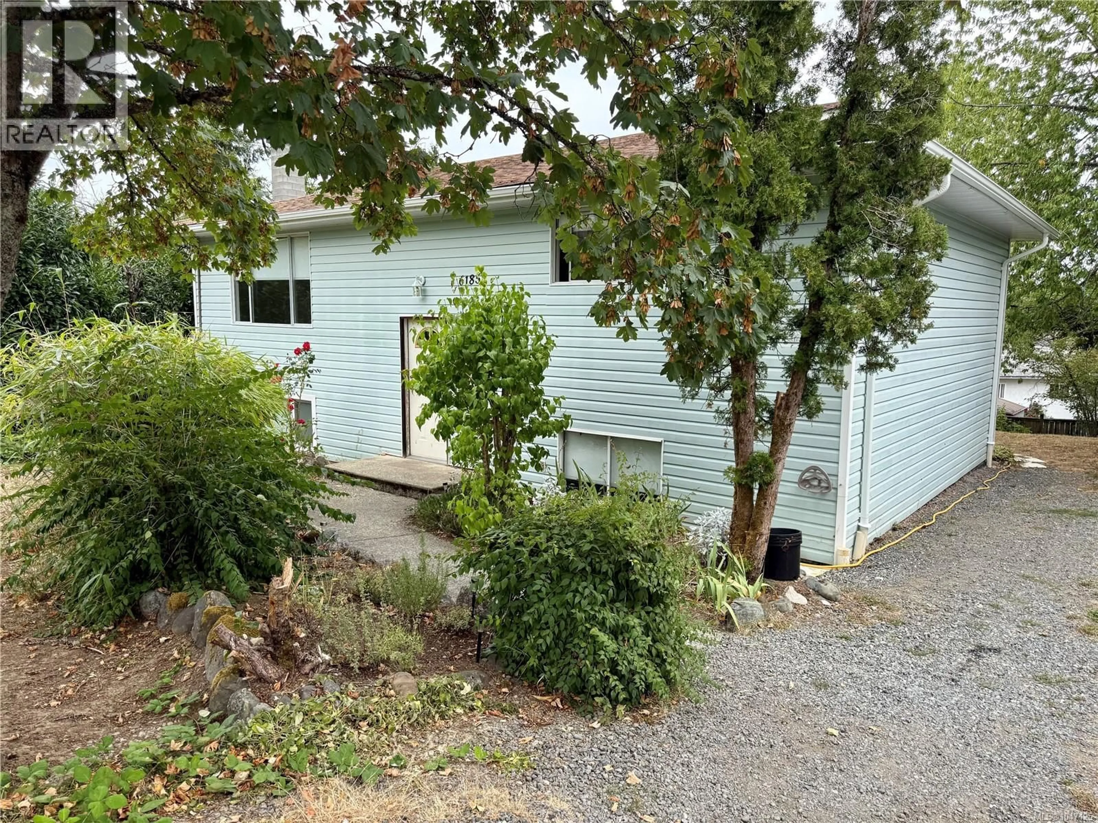 A pic from outside/outdoor area/front of a property/back of a property/a pic from drone, street for 6185 PALAHI ROAD, Duncan British Columbia V9L4Y8