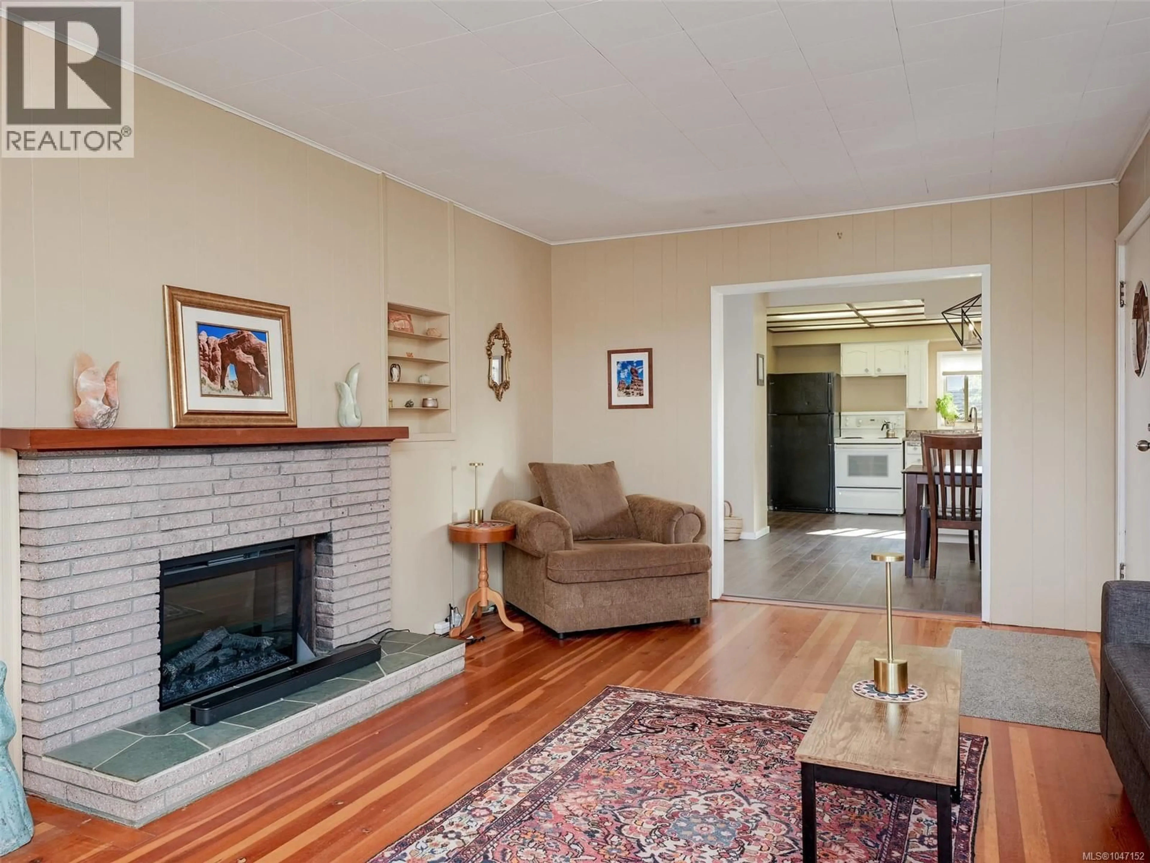 Living room with furniture, unknown for 1050 LESLIE DRIVE, Saanich British Columbia V8X2Y8