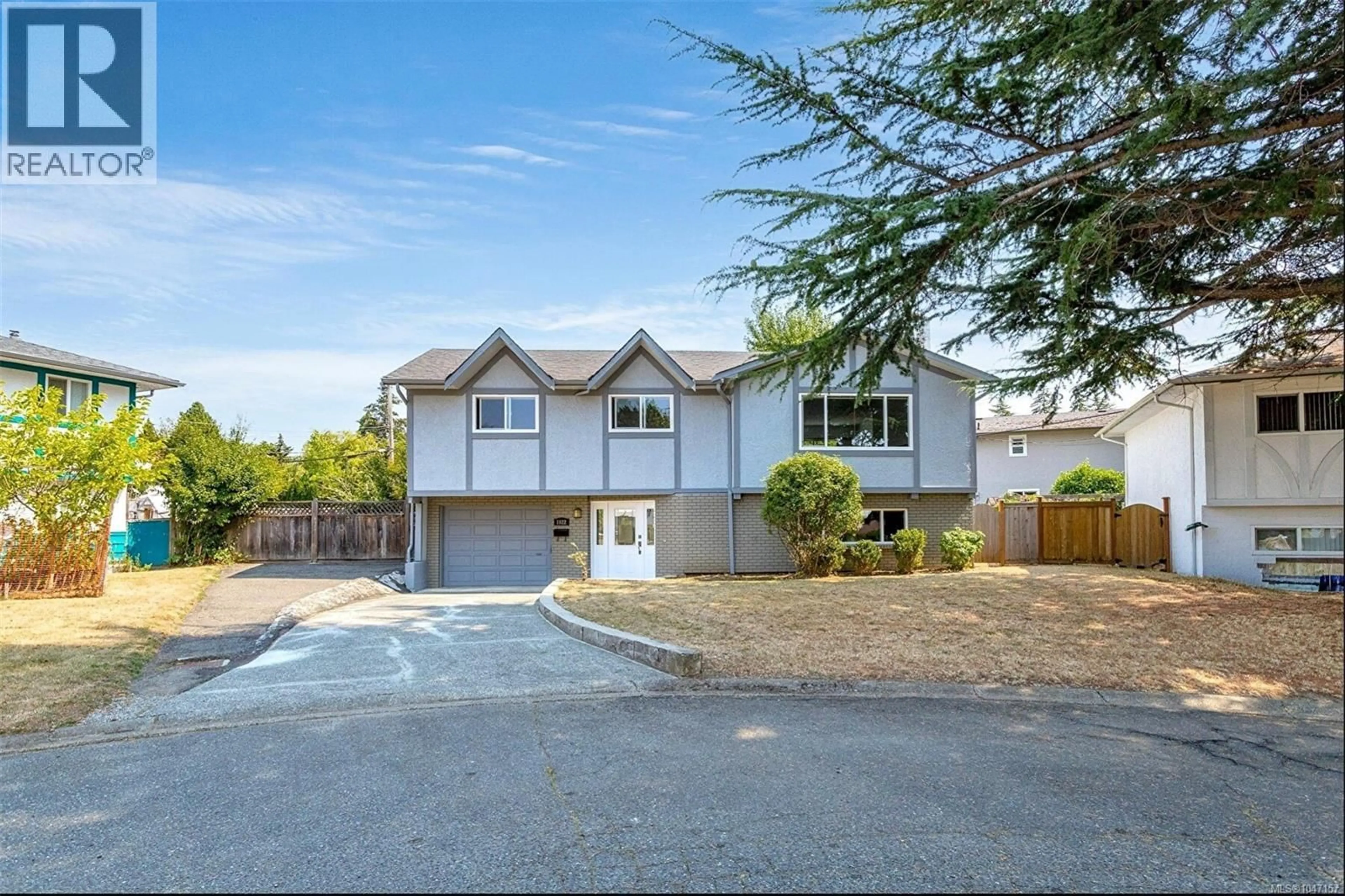 A pic from outside/outdoor area/front of a property/back of a property/a pic from drone, street for 1822 FAIRHURST AVENUE, Saanich British Columbia V8N1P4