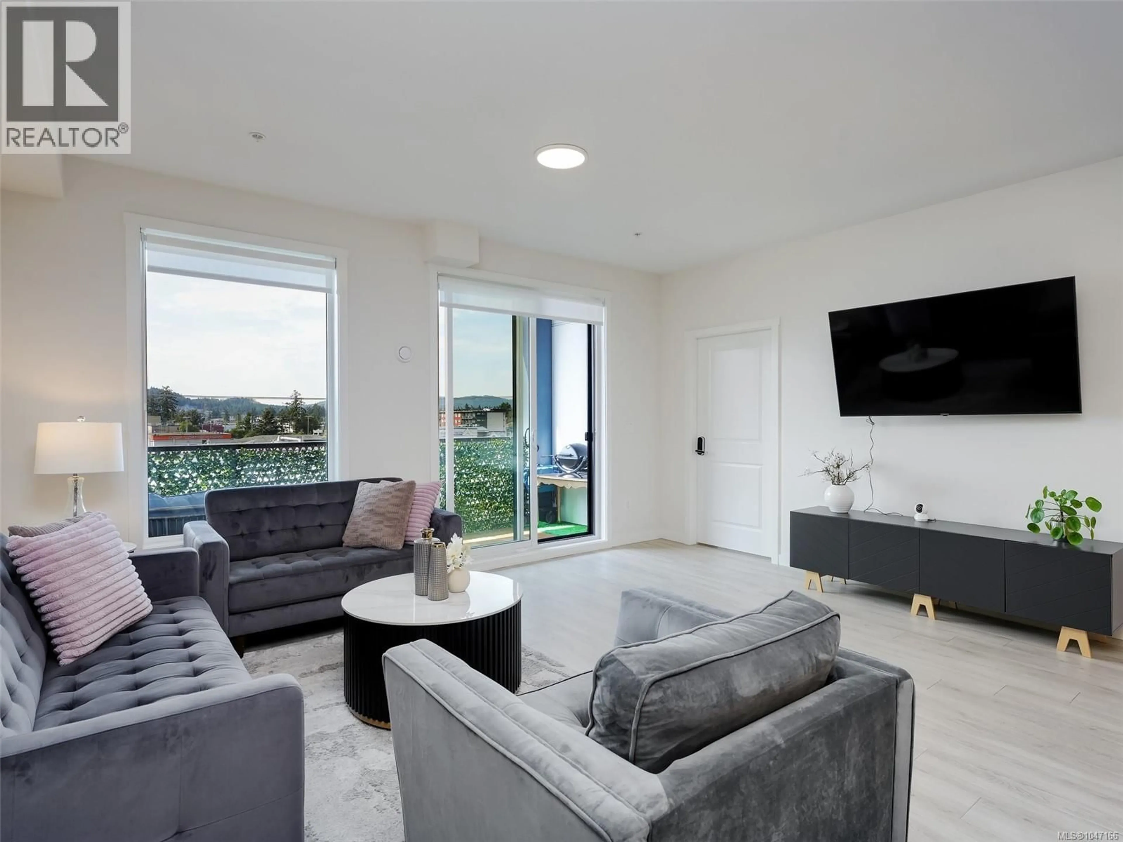 Living room with furniture, unknown for 405 - 842 ORONO AVENUE, Langford British Columbia V9B2T8