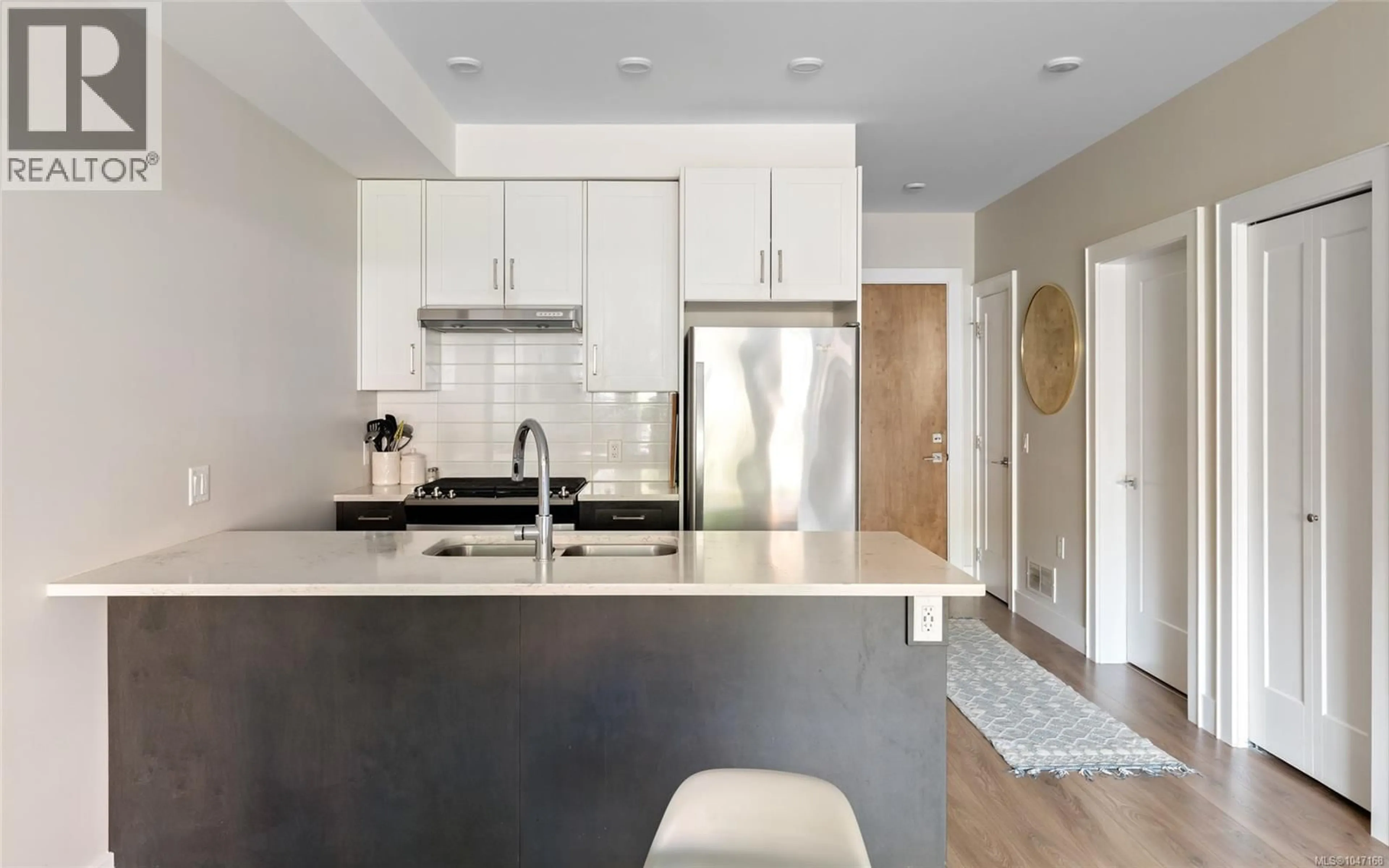 Open concept kitchen, ceramic/tile floor for 210 - 747 TRAVINO LANE, Saanich British Columbia V8Z0E2