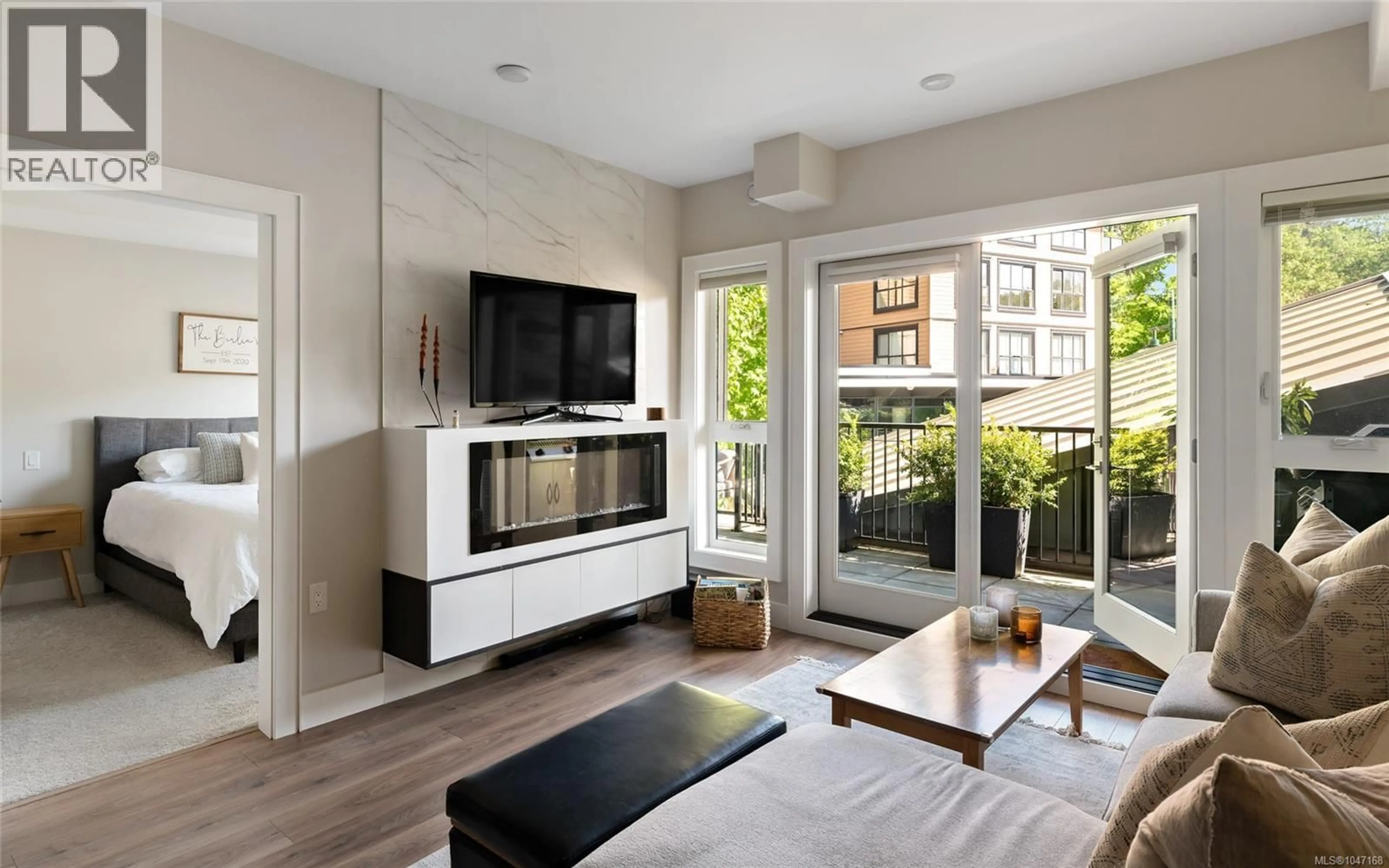 Living room with furniture, unknown for 210 - 747 TRAVINO LANE, Saanich British Columbia V8Z0E2