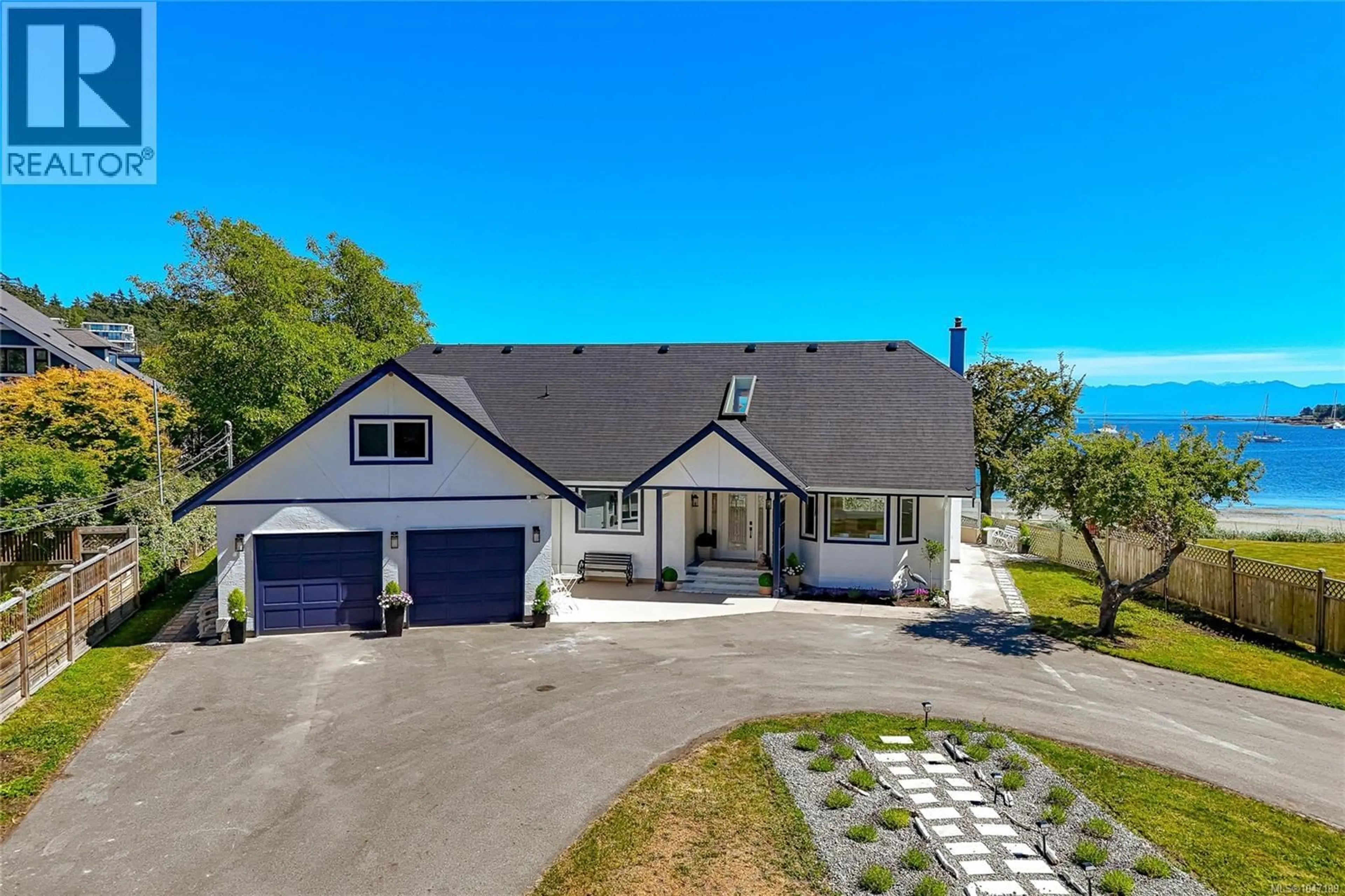 A pic from outside/outdoor area/front of a property/back of a property/a pic from drone, unknown for 3905B CADBORO BAY ROAD, Saanich British Columbia V8N4G3
