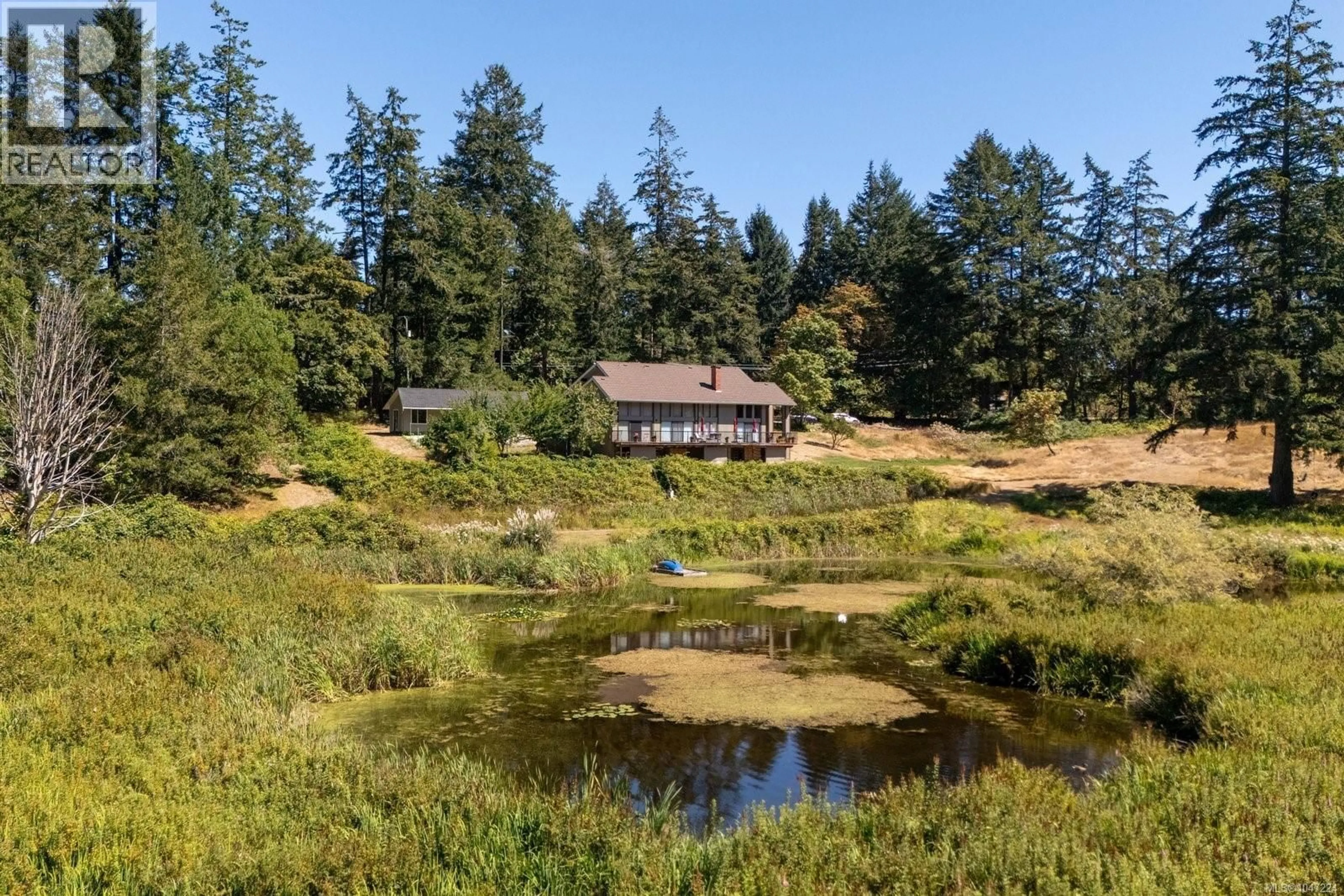 A pic from outside/outdoor area/front of a property/back of a property/a pic from drone, water/lake/river/ocean view for 5320 OLD WEST SAANICH ROAD, Saanich British Columbia V9E2A9