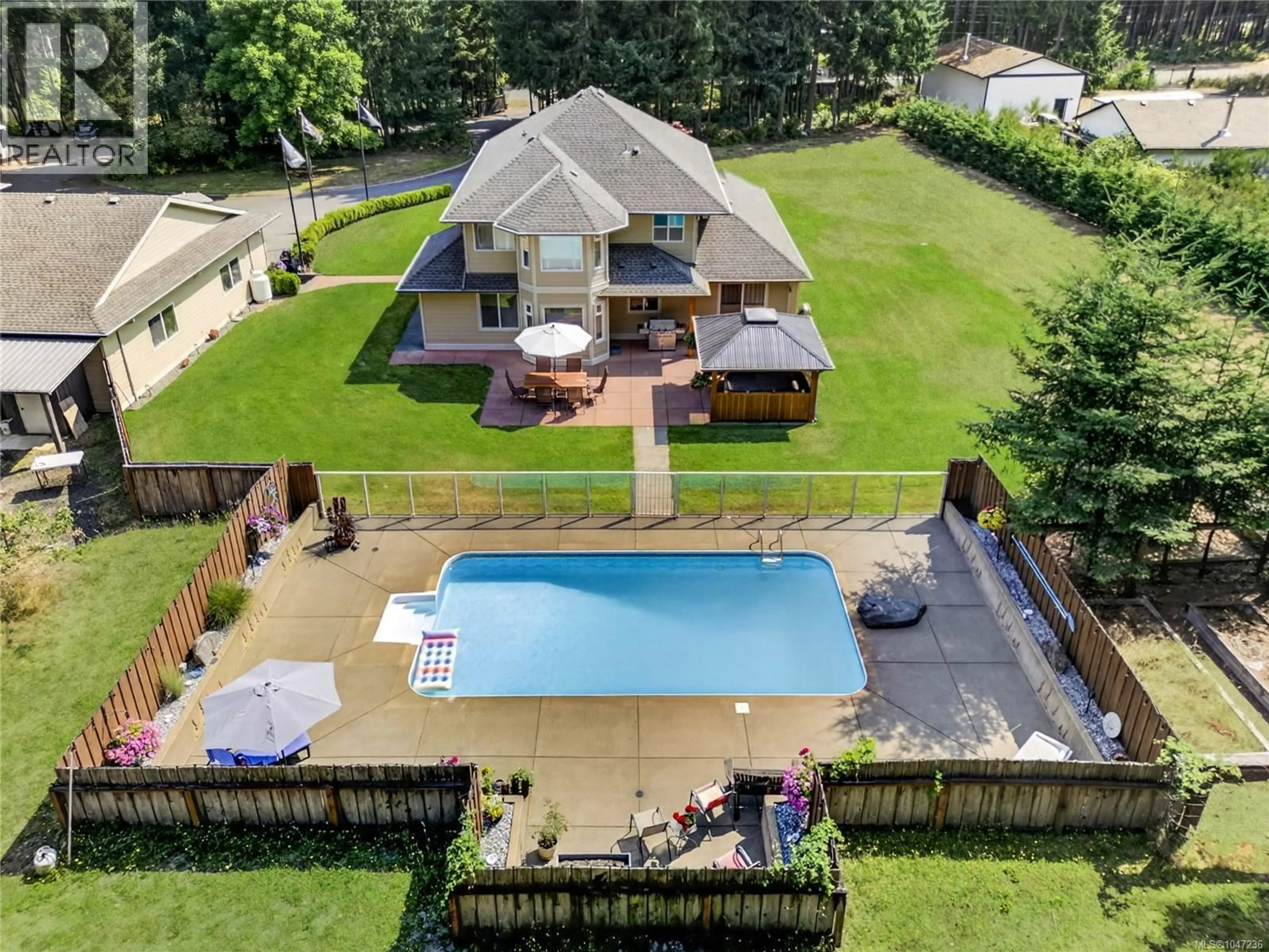 A pic from outside/outdoor area/front of a property/back of a property/a pic from drone, water/lake/river/ocean view for 2042 STEVEDOR ROAD, Courtenay British Columbia V9J1Y4