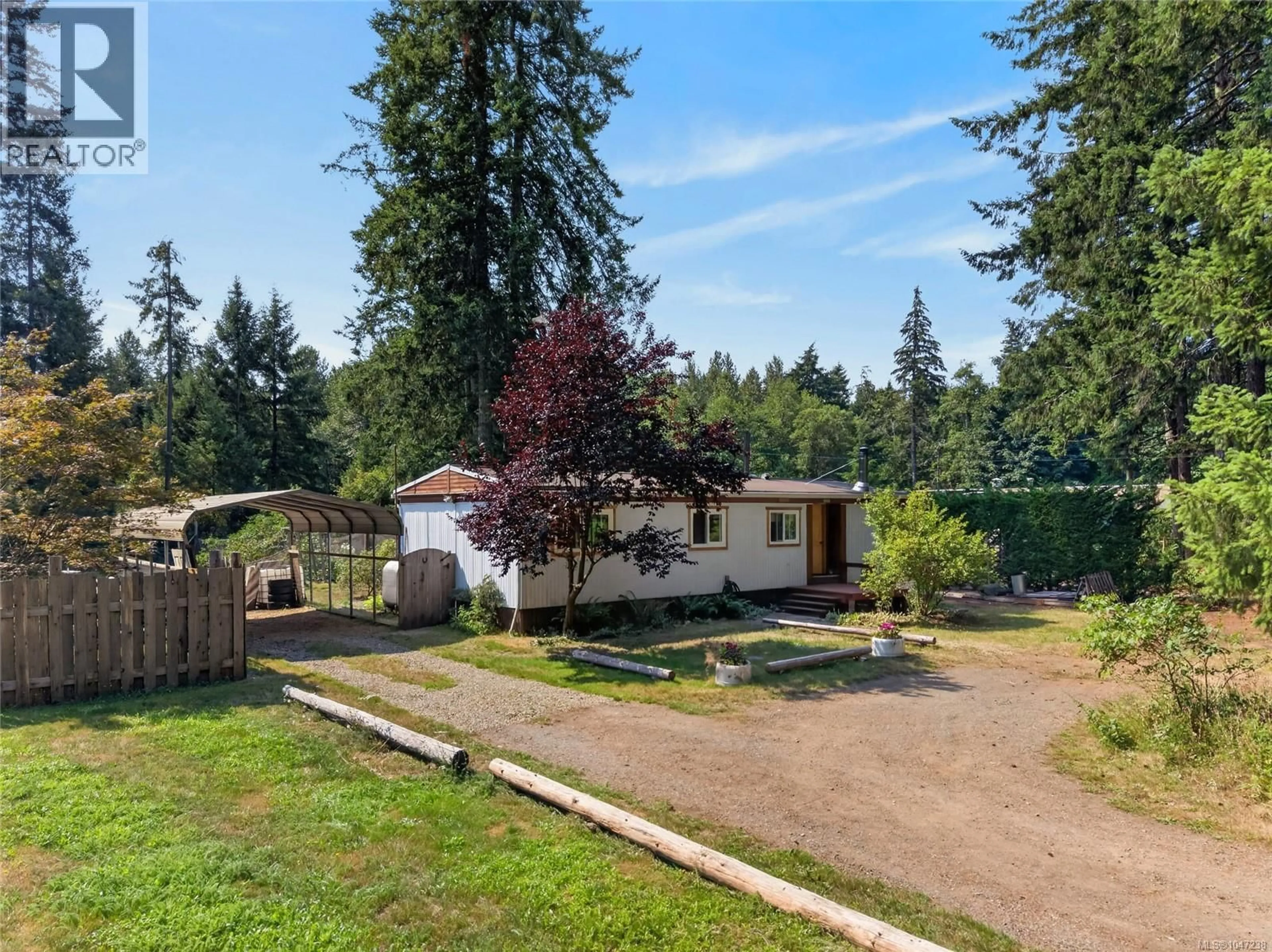 A pic from outside/outdoor area/front of a property/back of a property/a pic from drone, unknown for 2169 REGENT ROAD, Black Creek British Columbia V9J1A1