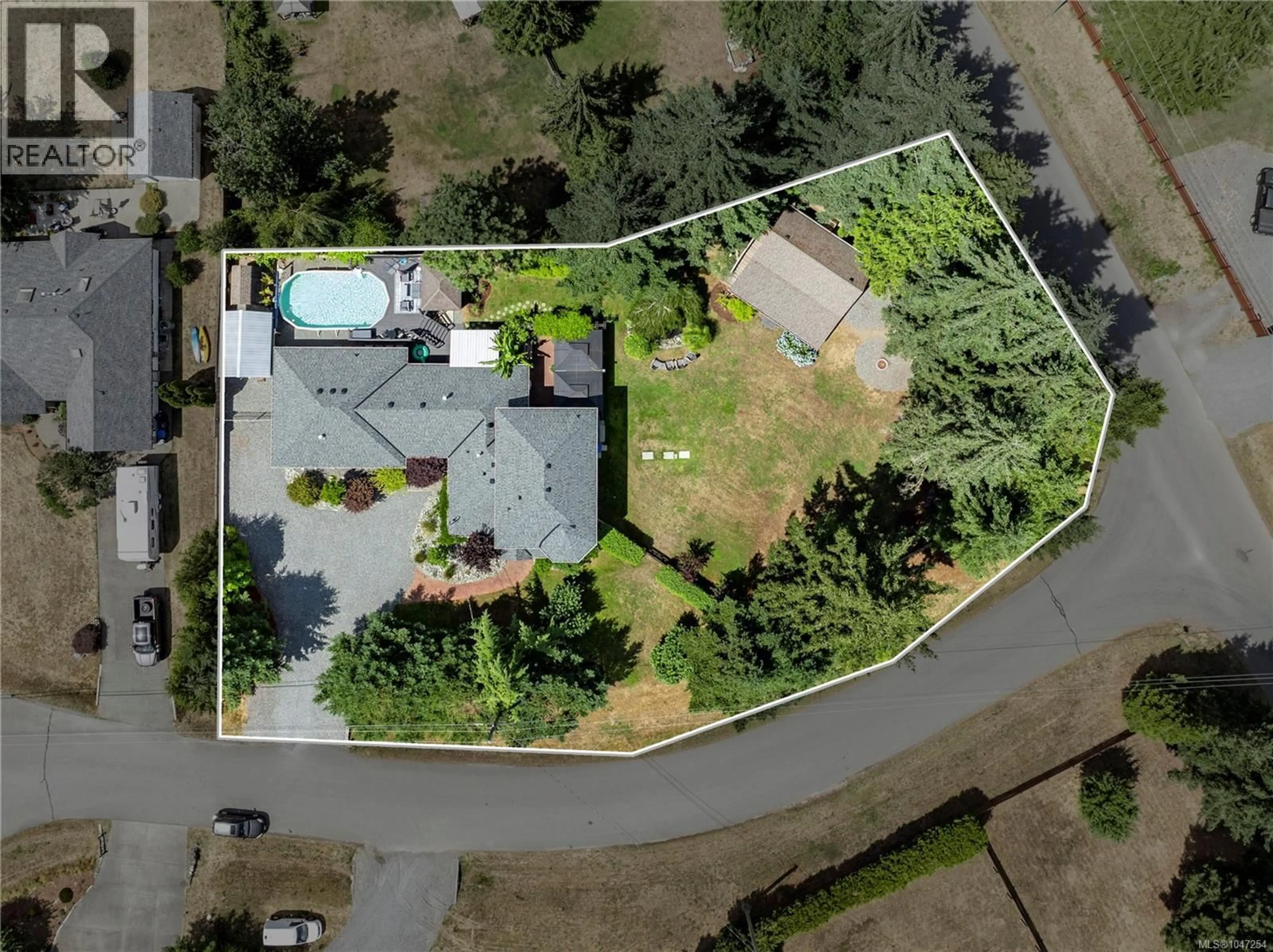 A pic from outside/outdoor area/front of a property/back of a property/a pic from drone, street for 2071 SARAS WAY, Nanaimo British Columbia V9X1K6