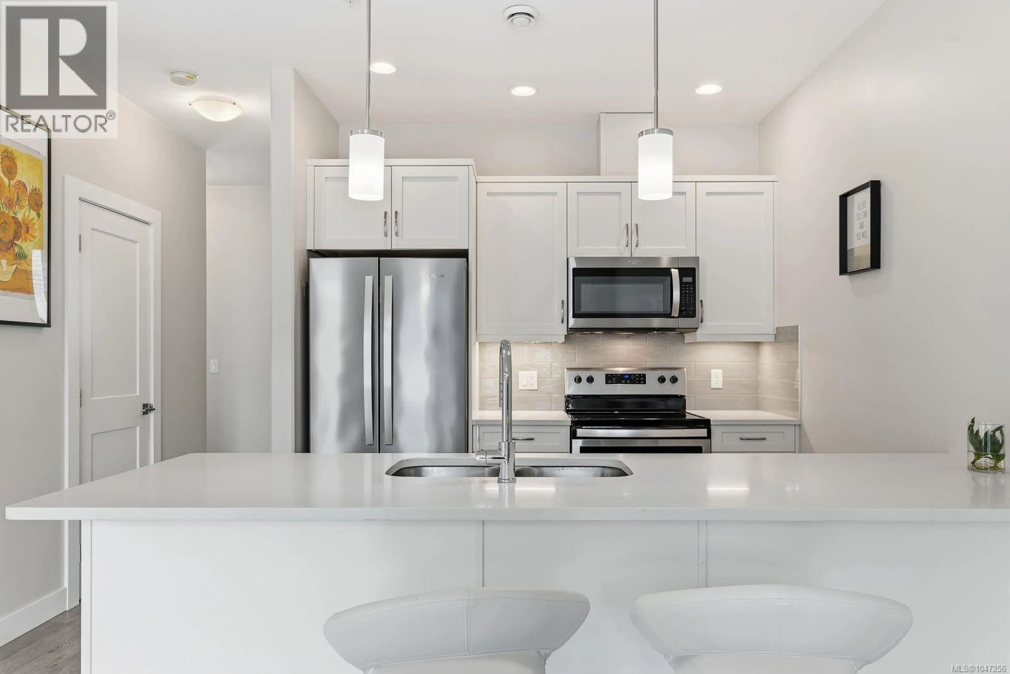 Open concept kitchen, ceramic/tile floor for 110 - 1800 SUMMERHILL PLACE, Nanaimo British Columbia V9S0C7