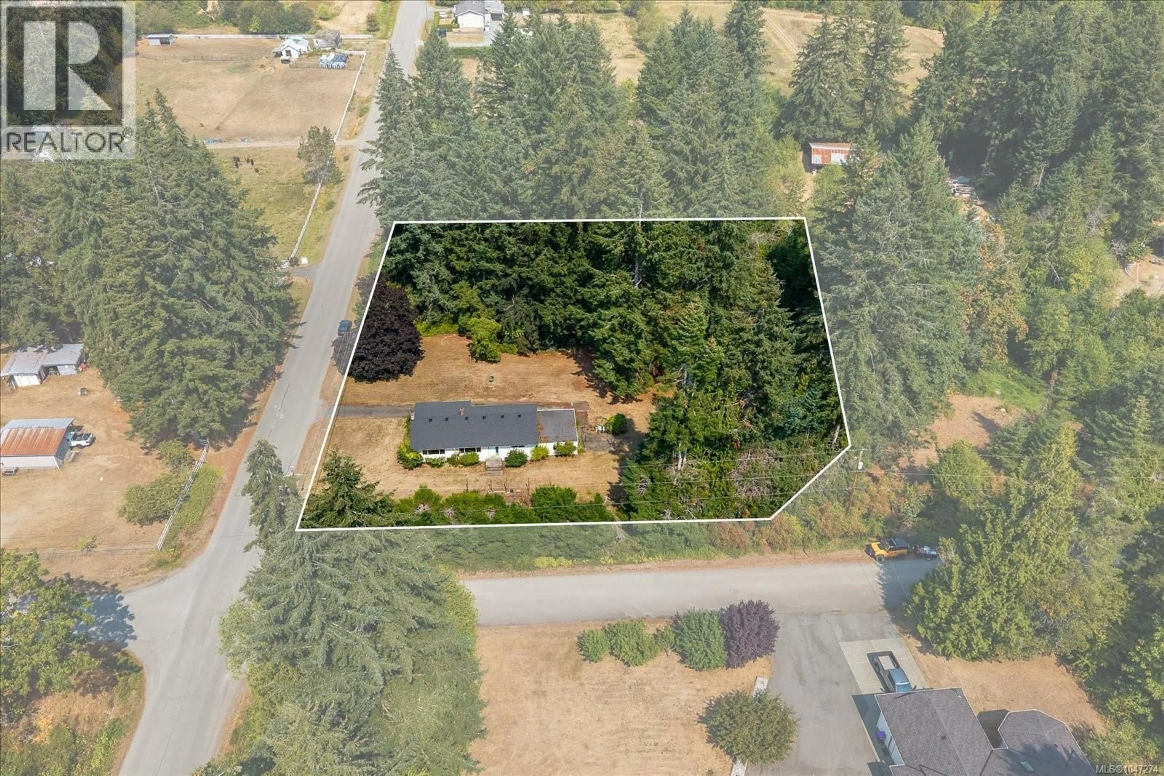 A pic from outside/outdoor area/front of a property/back of a property/a pic from drone, forest/trees view for 3410 DURNIN ROAD, Nanaimo British Columbia V9R6V5