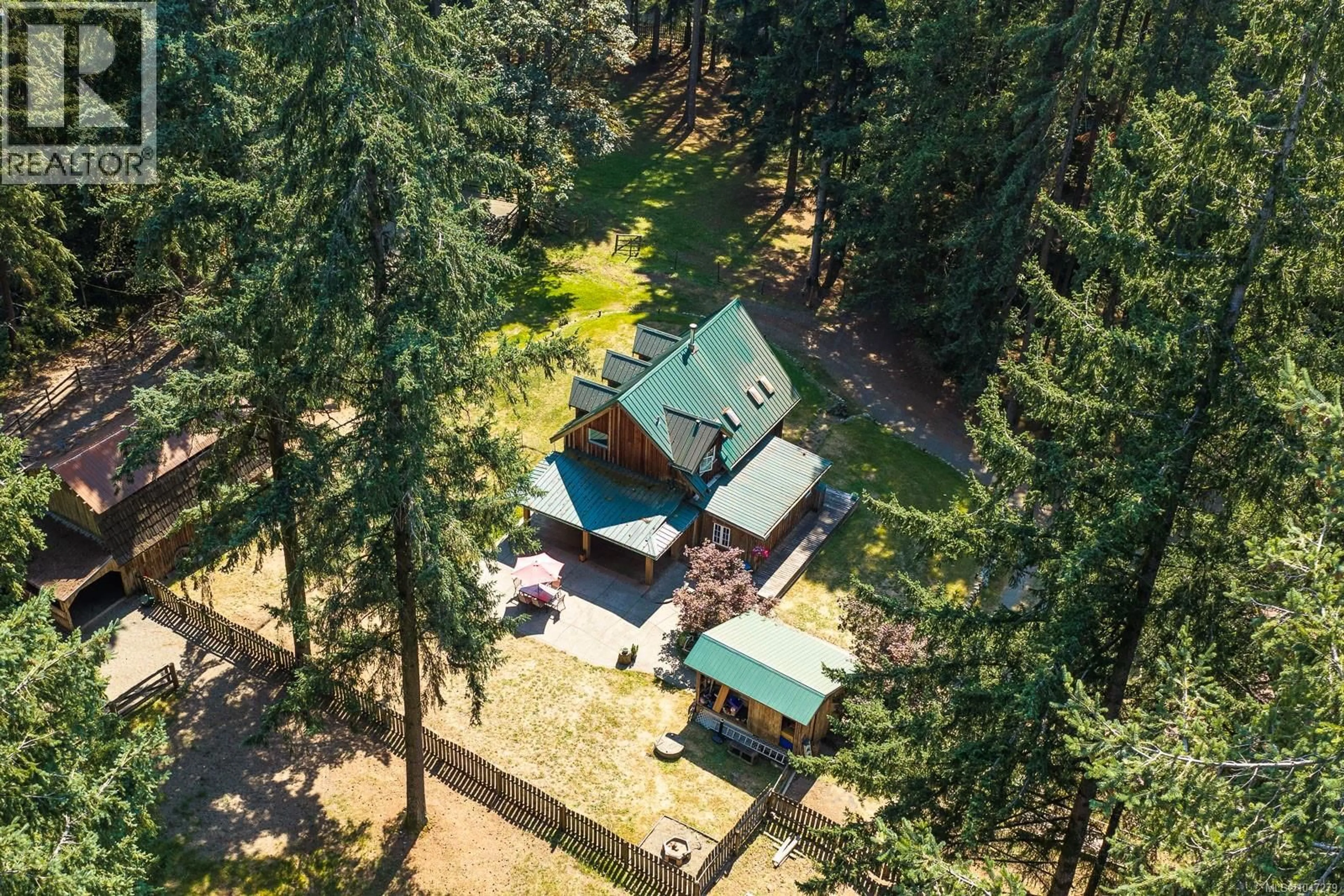 A pic from outside/outdoor area/front of a property/back of a property/a pic from drone, forest/trees view for 1584 NURMI ROAD, Merville British Columbia V0R2M0