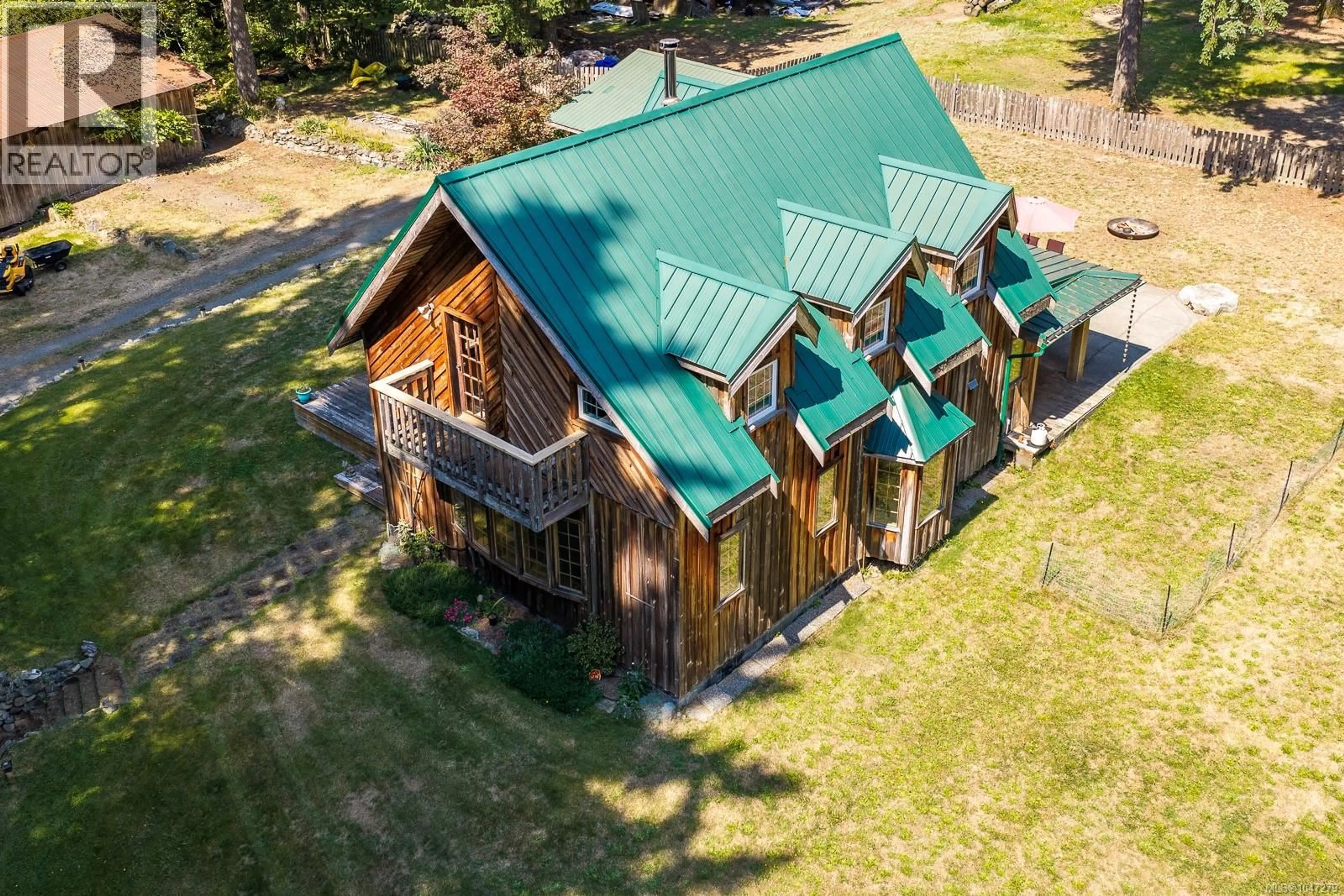 A pic from outside/outdoor area/front of a property/back of a property/a pic from drone, building for 1584 NURMI ROAD, Merville British Columbia V0R2M0