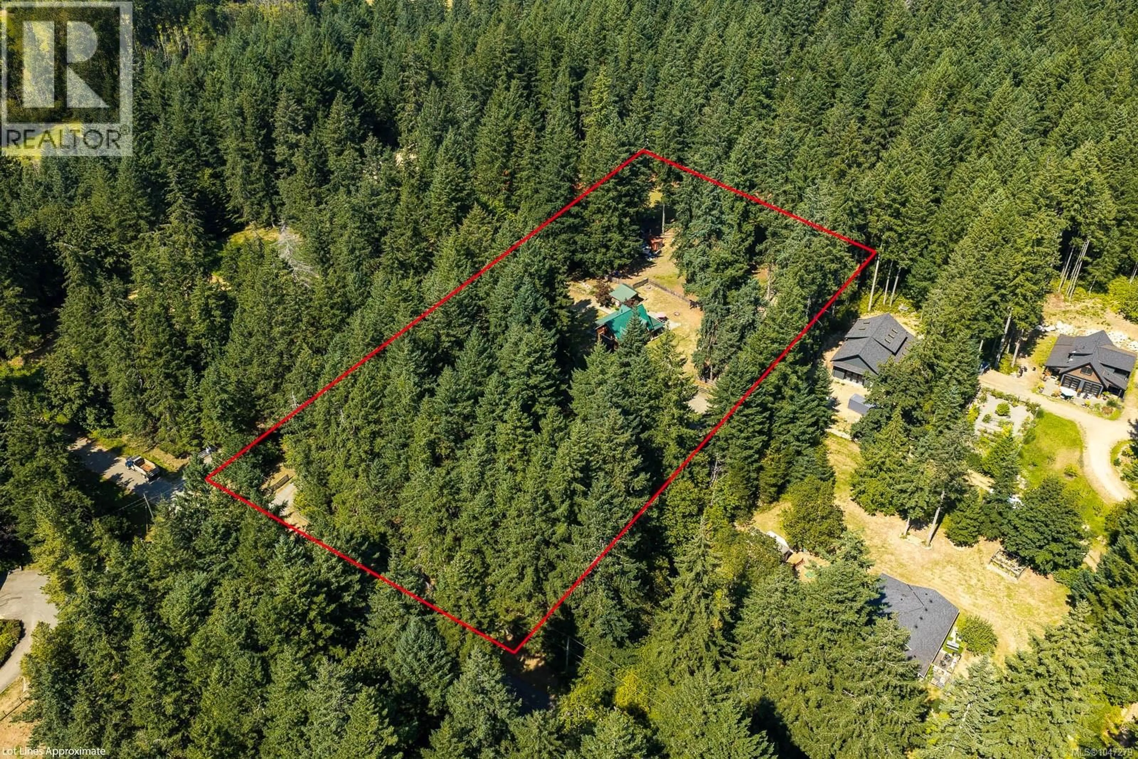 A pic from outside/outdoor area/front of a property/back of a property/a pic from drone, forest/trees view for 1584 NURMI ROAD, Merville British Columbia V0R2M0