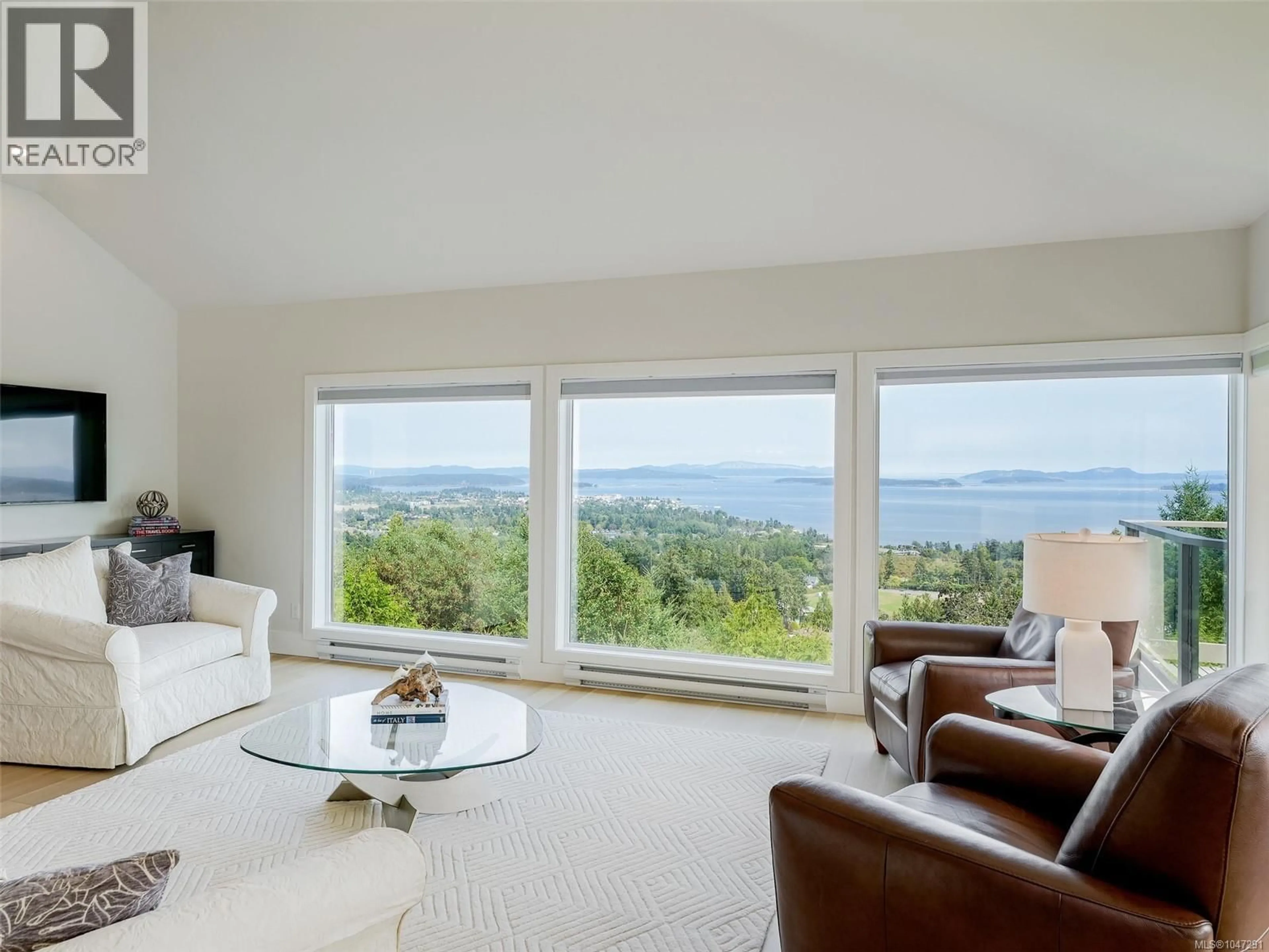 Living room with furniture, unknown for 8865 PARK PACIFIC TERRACE, North Saanich British Columbia V8L5B1