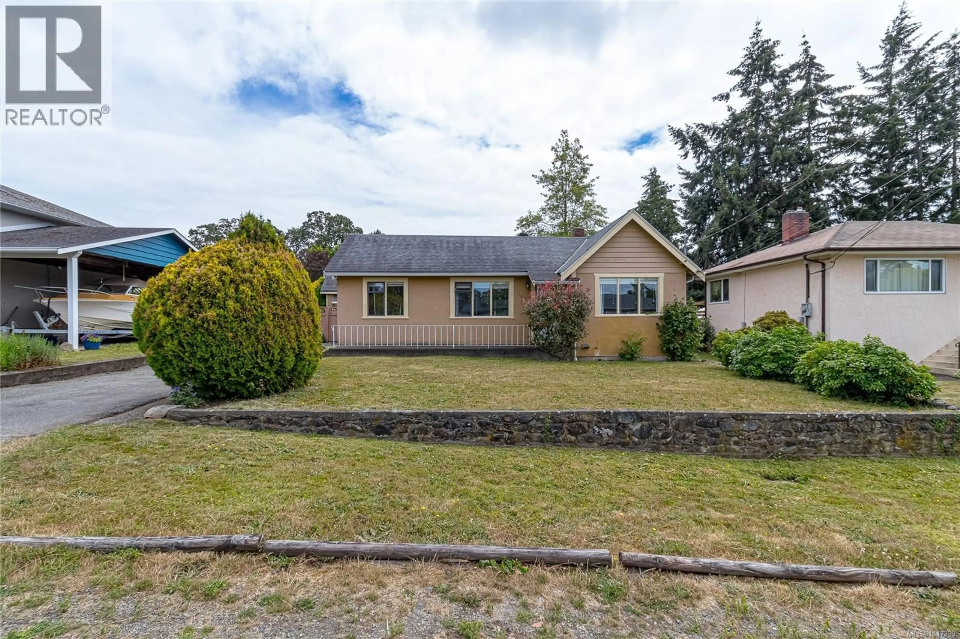 A pic from outside/outdoor area/front of a property/back of a property/a pic from drone, street for 1263 GARKIL ROAD, Saanich British Columbia V8P2L2