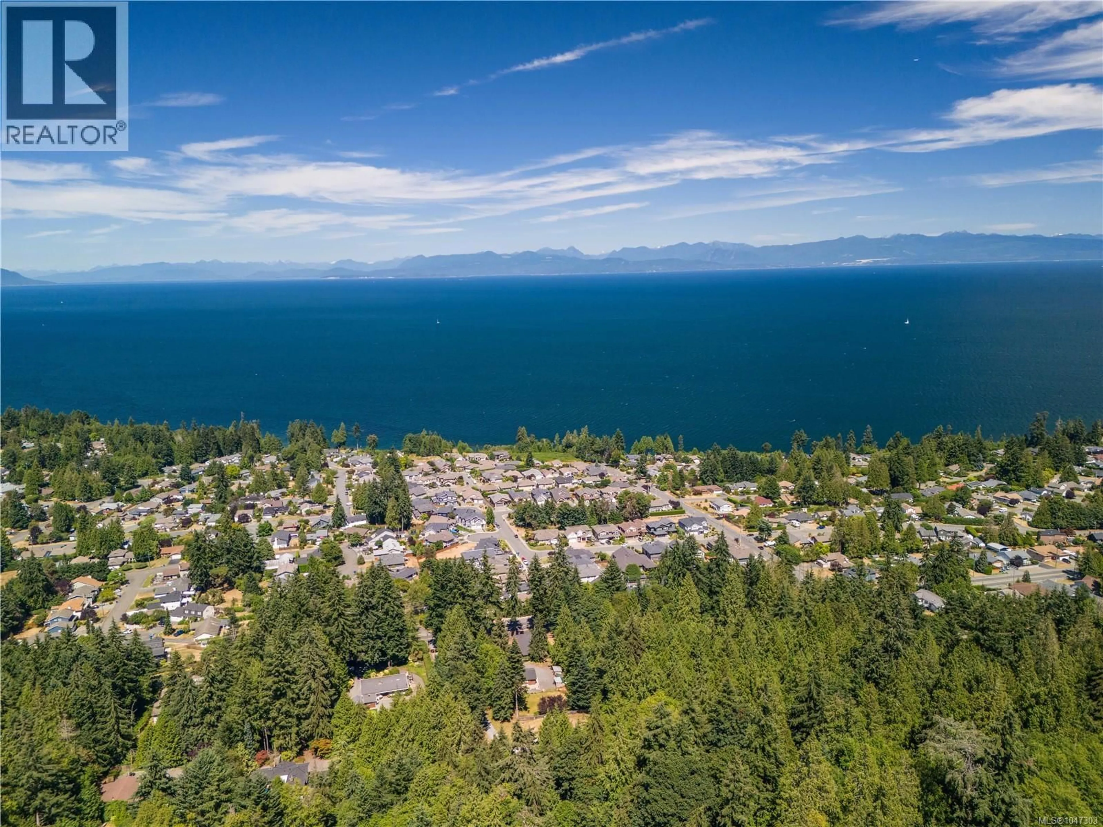 A pic from outside/outdoor area/front of a property/back of a property/a pic from drone, water/lake/river/ocean view for 5650 ALDER WAY, Nanaimo British Columbia V9T5N4