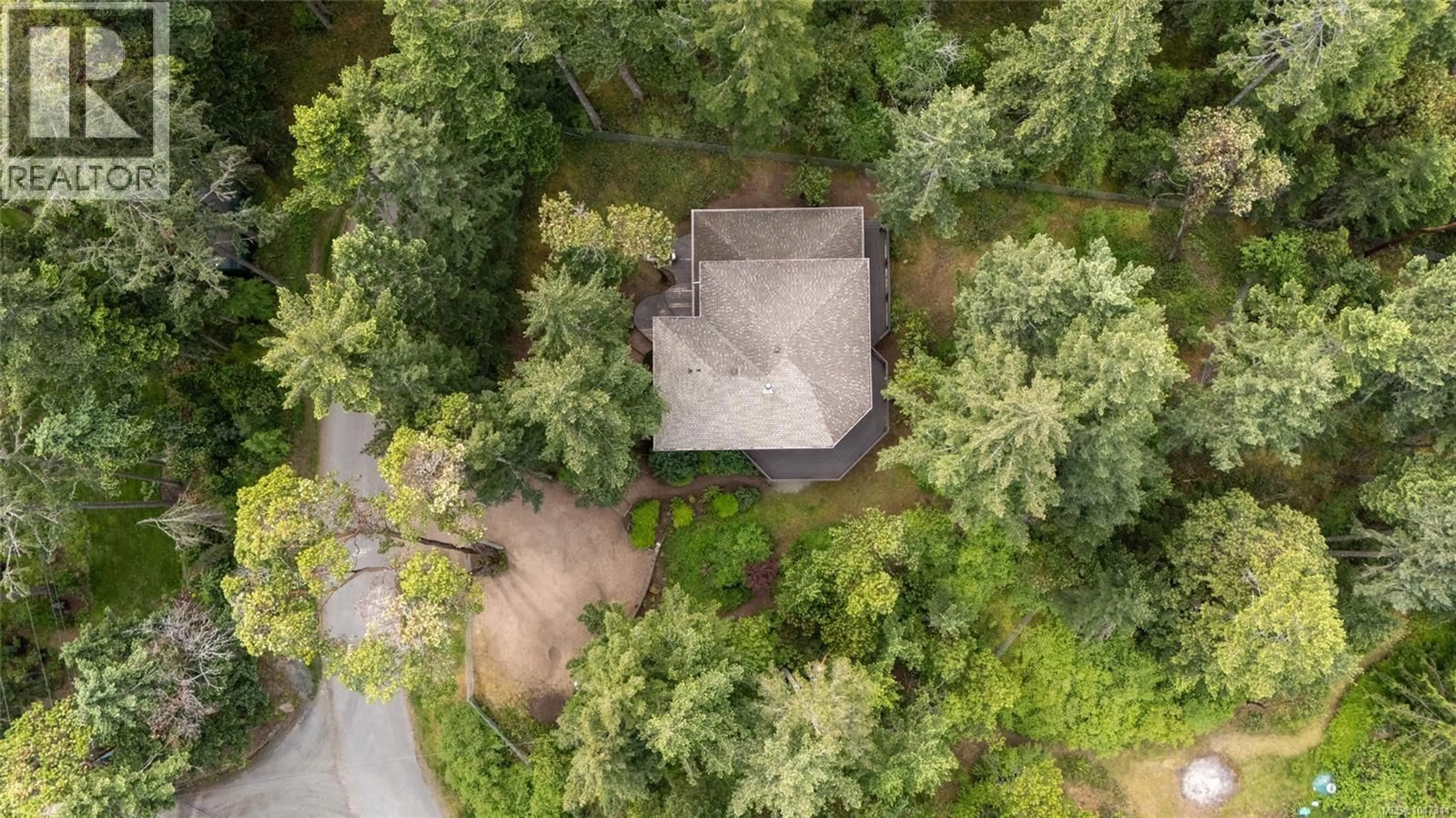 A pic from outside/outdoor area/front of a property/back of a property/a pic from drone, forest/trees view for 908 LITTLE MOUNTAIN ROAD, Errington British Columbia V9P2C3