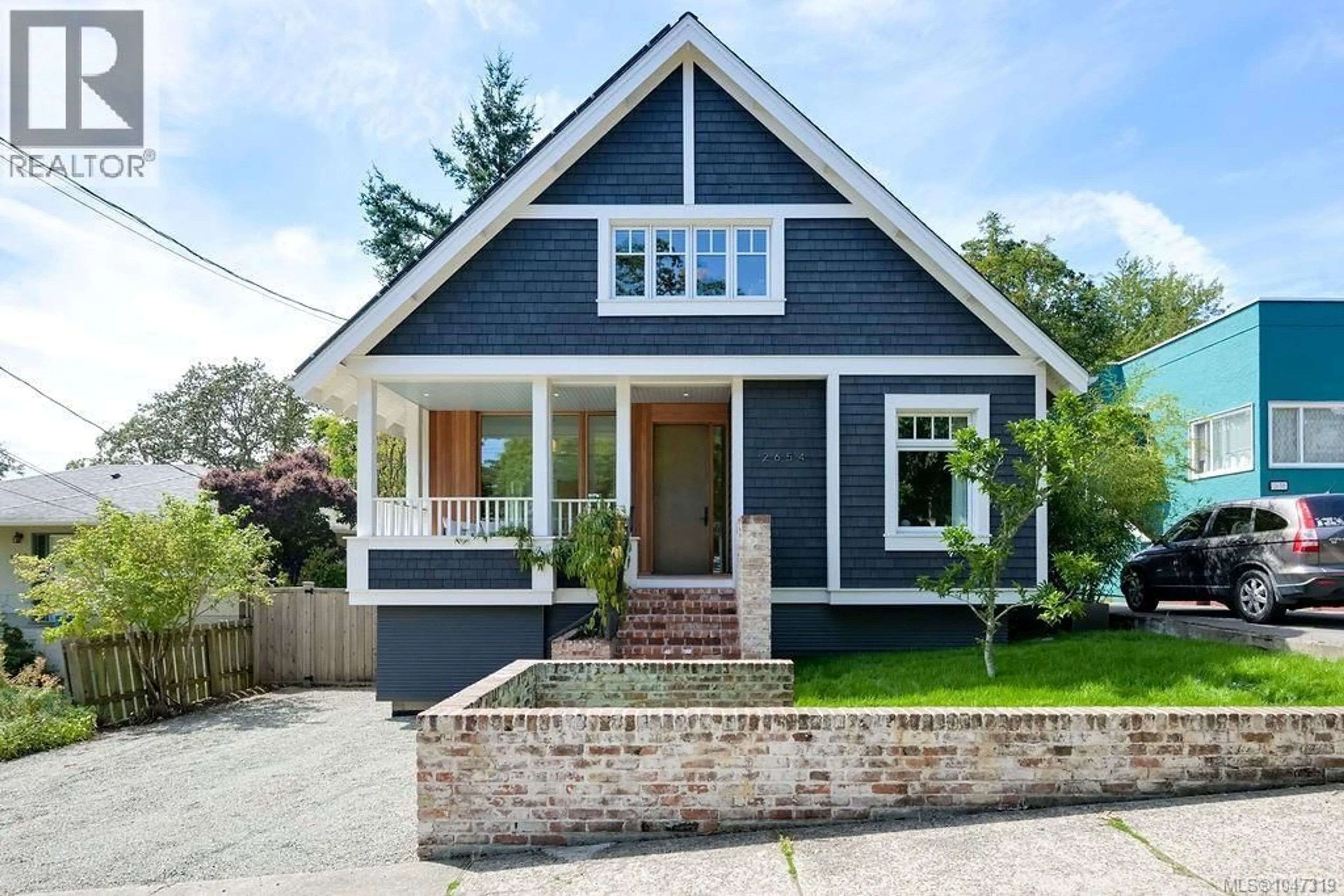 Home with brick exterior material, street for 2654 FERNWOOD ROAD, Victoria British Columbia V8T3A2