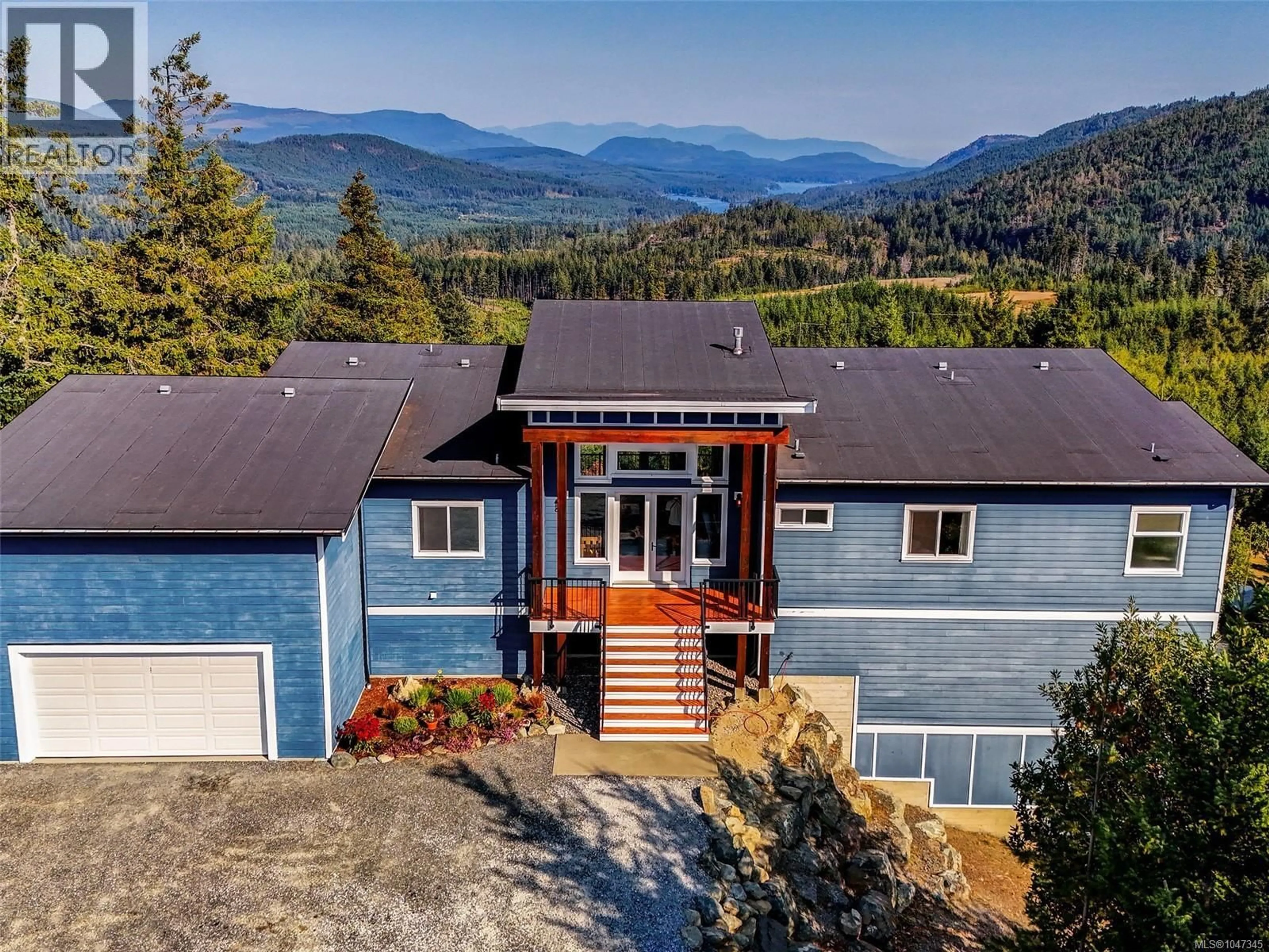 A pic from outside/outdoor area/front of a property/back of a property/a pic from drone, mountain view for 4836 GOLDSTREAM HEIGHTS DRIVE, Shawnigan Lake British Columbia V8H2J1