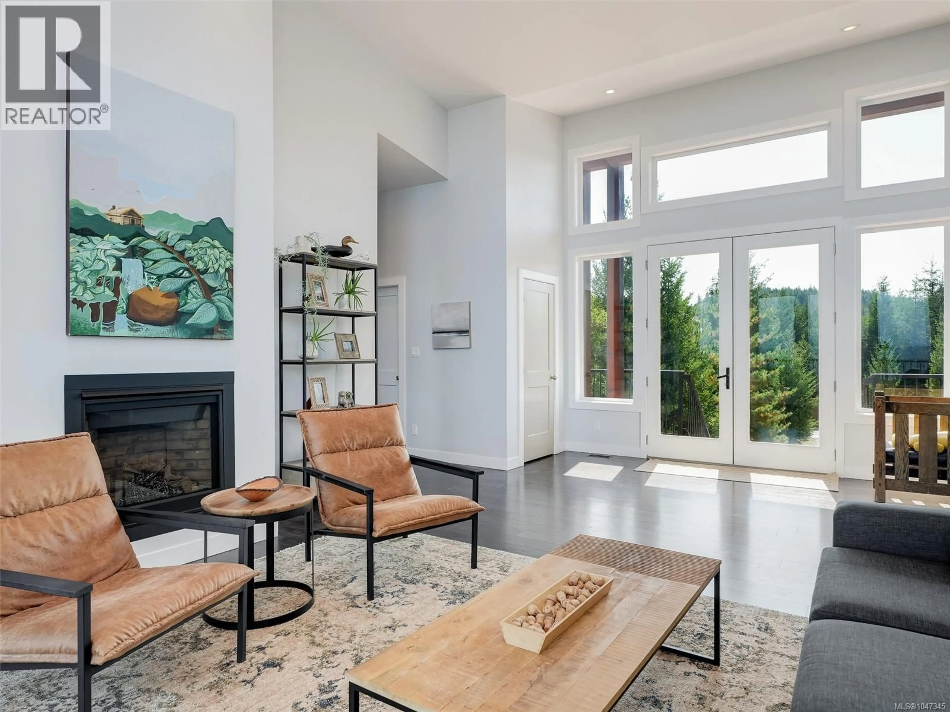 Living room with furniture, unknown for 4836 GOLDSTREAM HEIGHTS DRIVE, Shawnigan Lake British Columbia V8H2J1