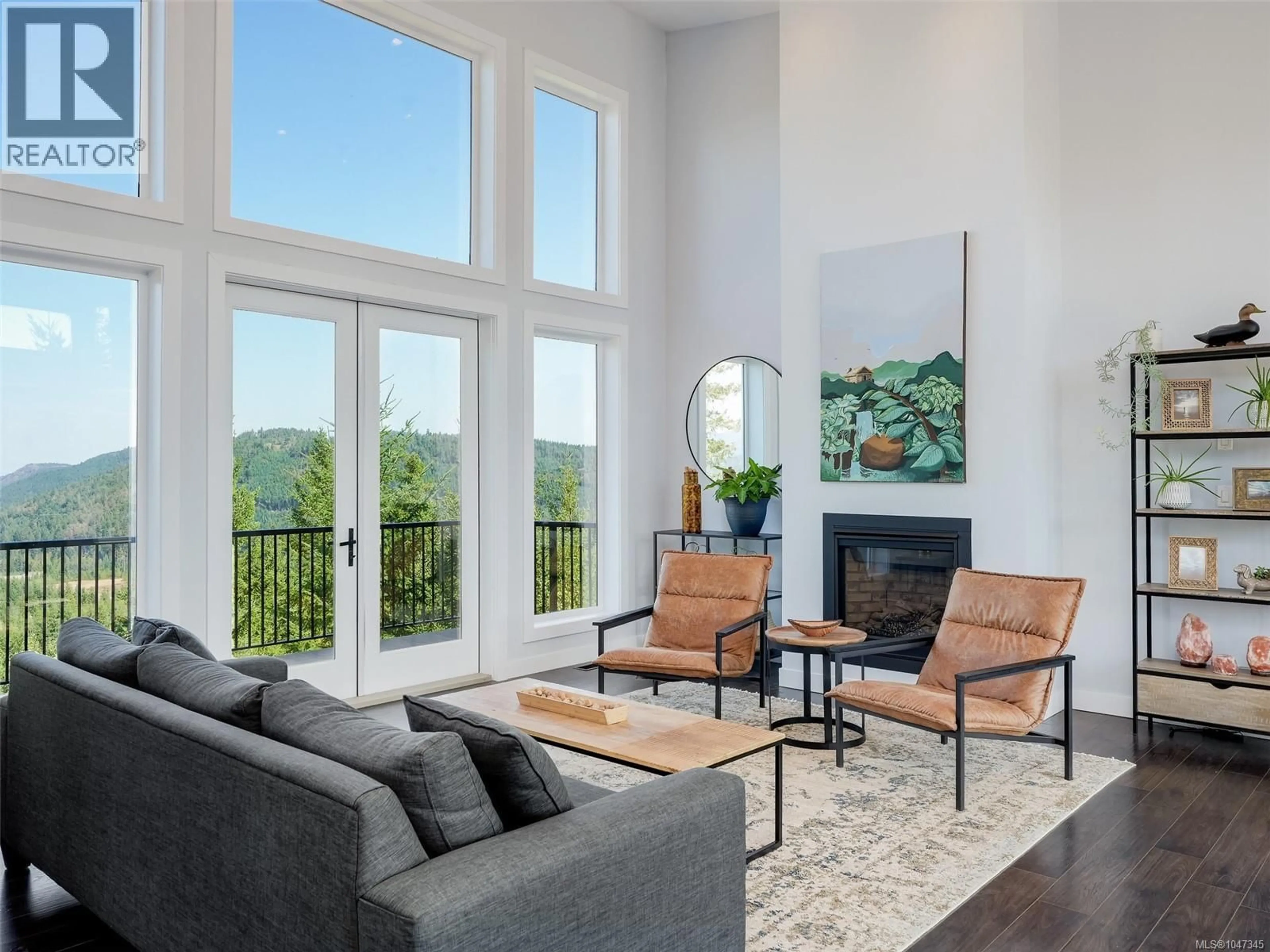 Living room with furniture, unknown for 4836 GOLDSTREAM HEIGHTS DRIVE, Shawnigan Lake British Columbia V8H2J1