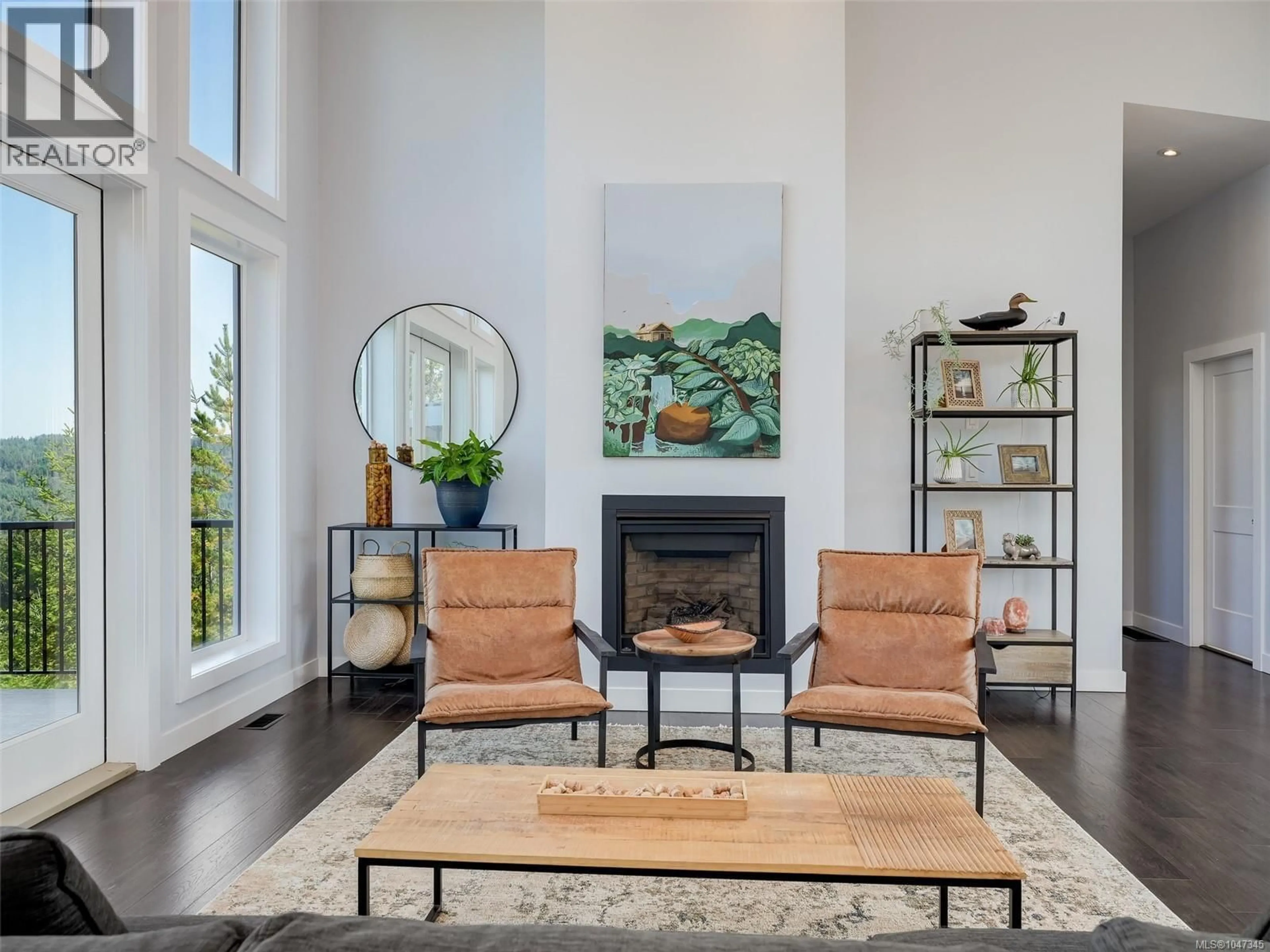 Living room with furniture, unknown for 4836 GOLDSTREAM HEIGHTS DRIVE, Shawnigan Lake British Columbia V8H2J1