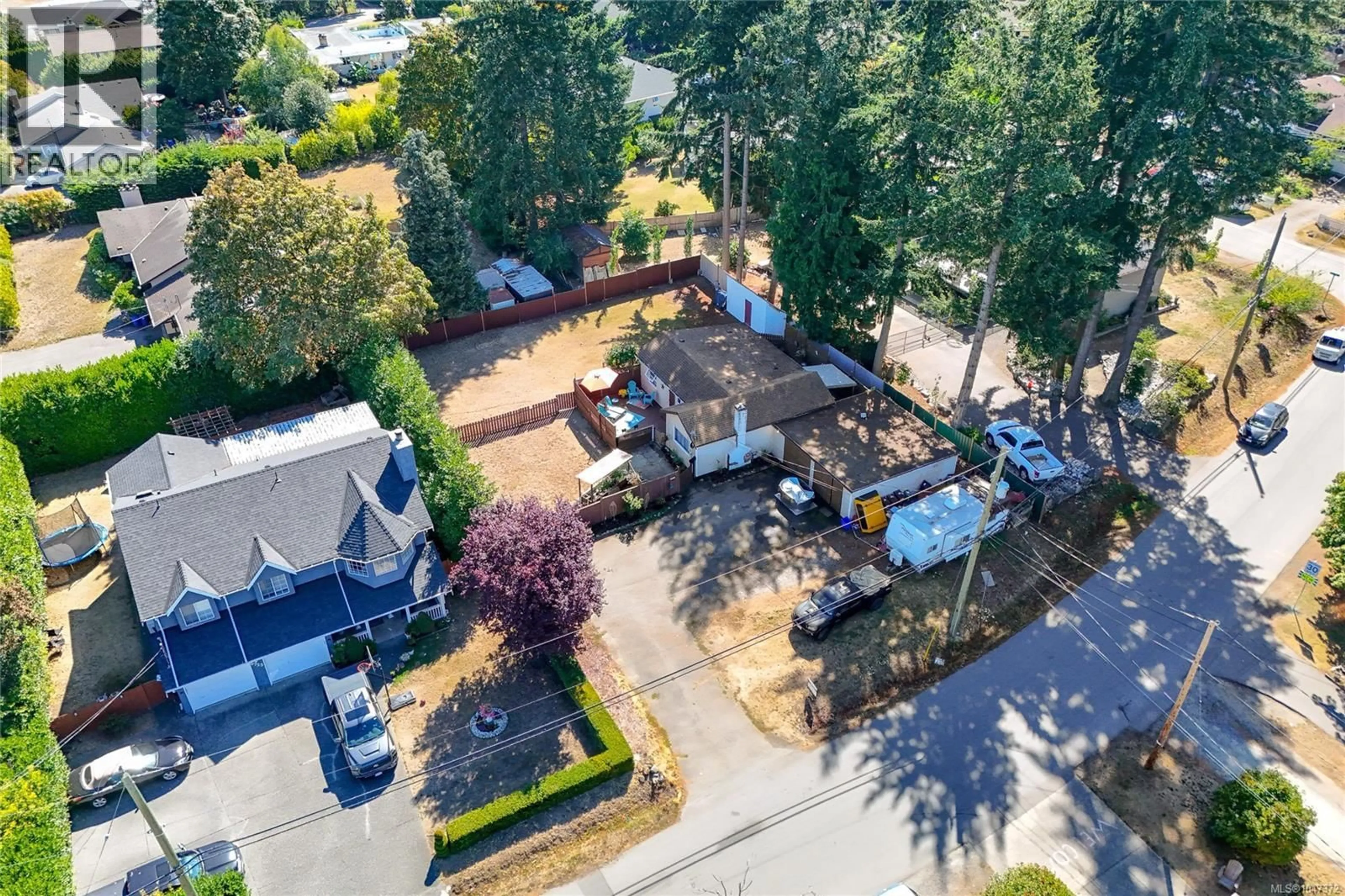 A pic from outside/outdoor area/front of a property/back of a property/a pic from drone, street for 6713 BUENA VISTA ROAD, Central Saanich British Columbia V8Z5X1