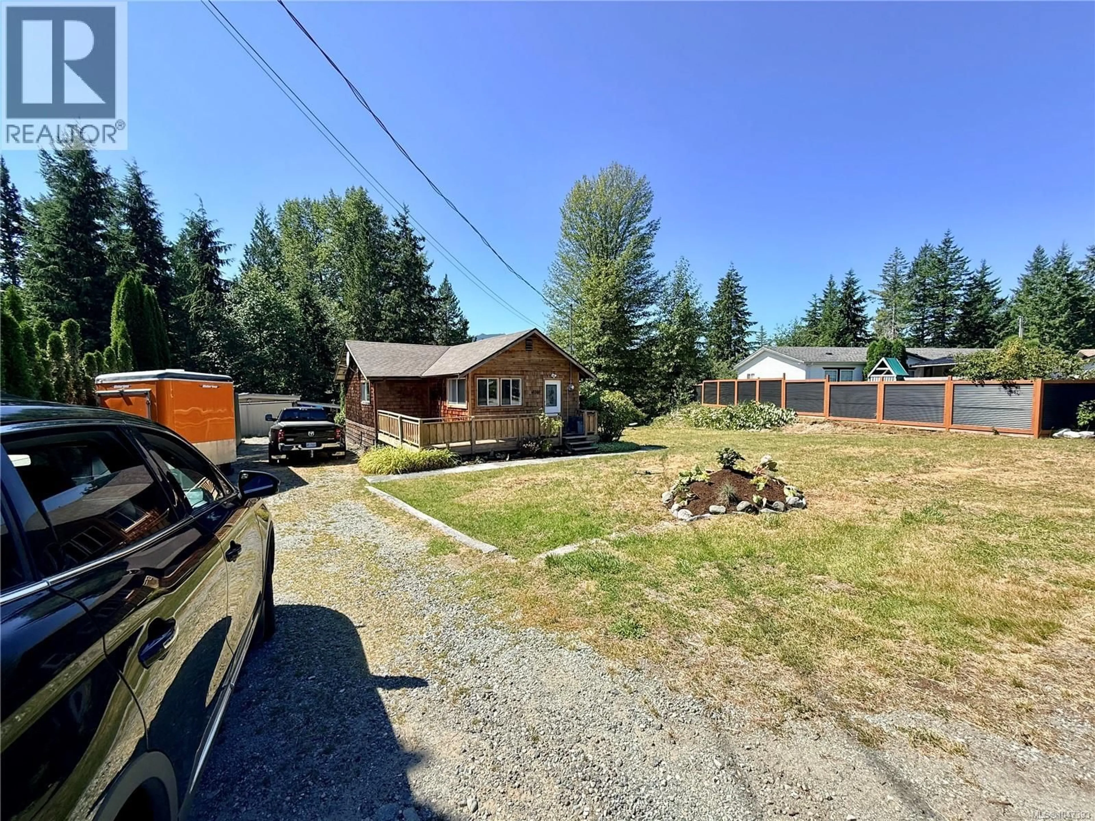 A pic from outside/outdoor area/front of a property/back of a property/a pic from drone, street for 4069 NIMPKISH CRESCENT, Woss British Columbia V0N3P0