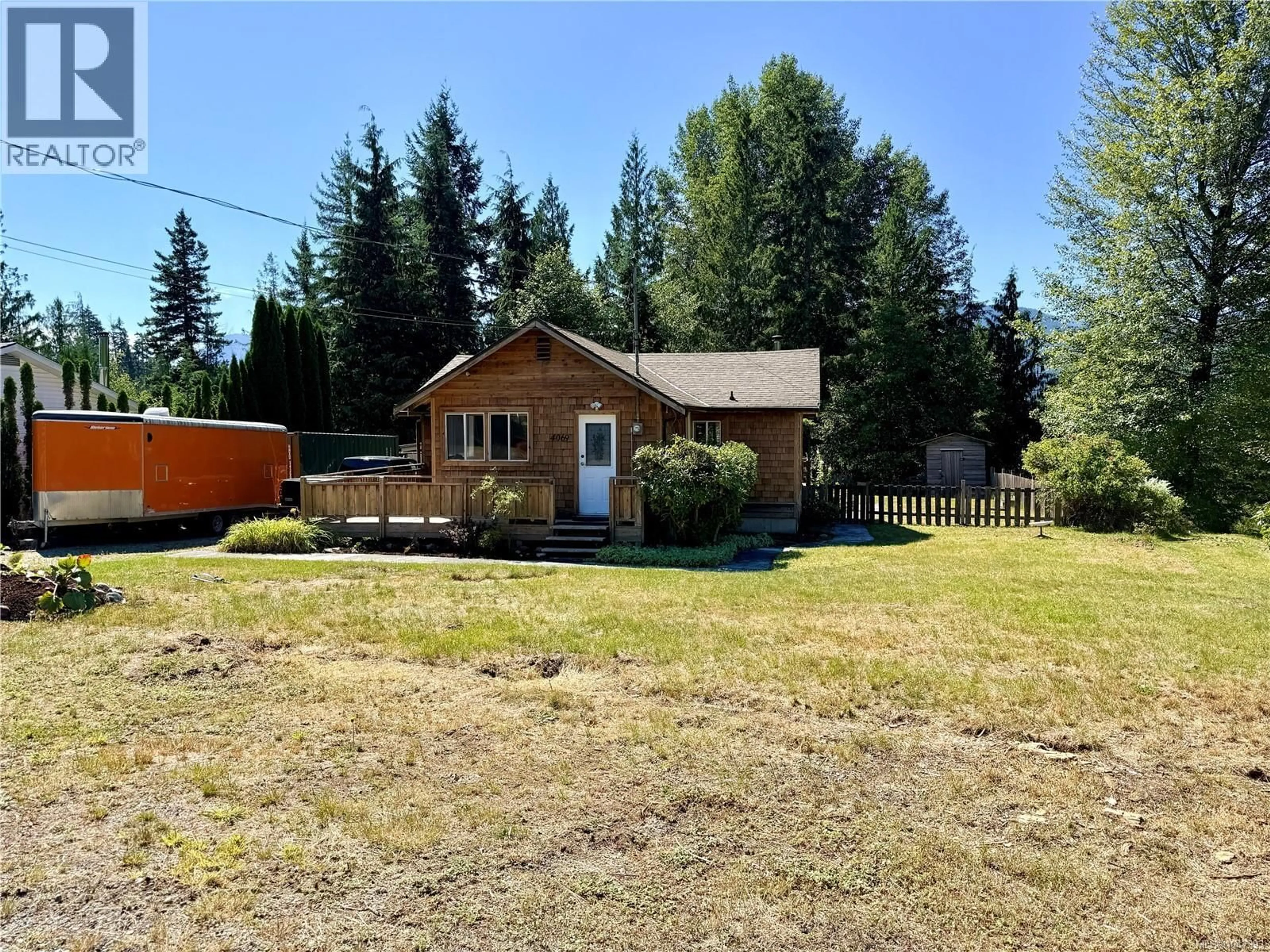 A pic from outside/outdoor area/front of a property/back of a property/a pic from drone, unknown for 4069 NIMPKISH CRESCENT, Woss British Columbia V0N3P0