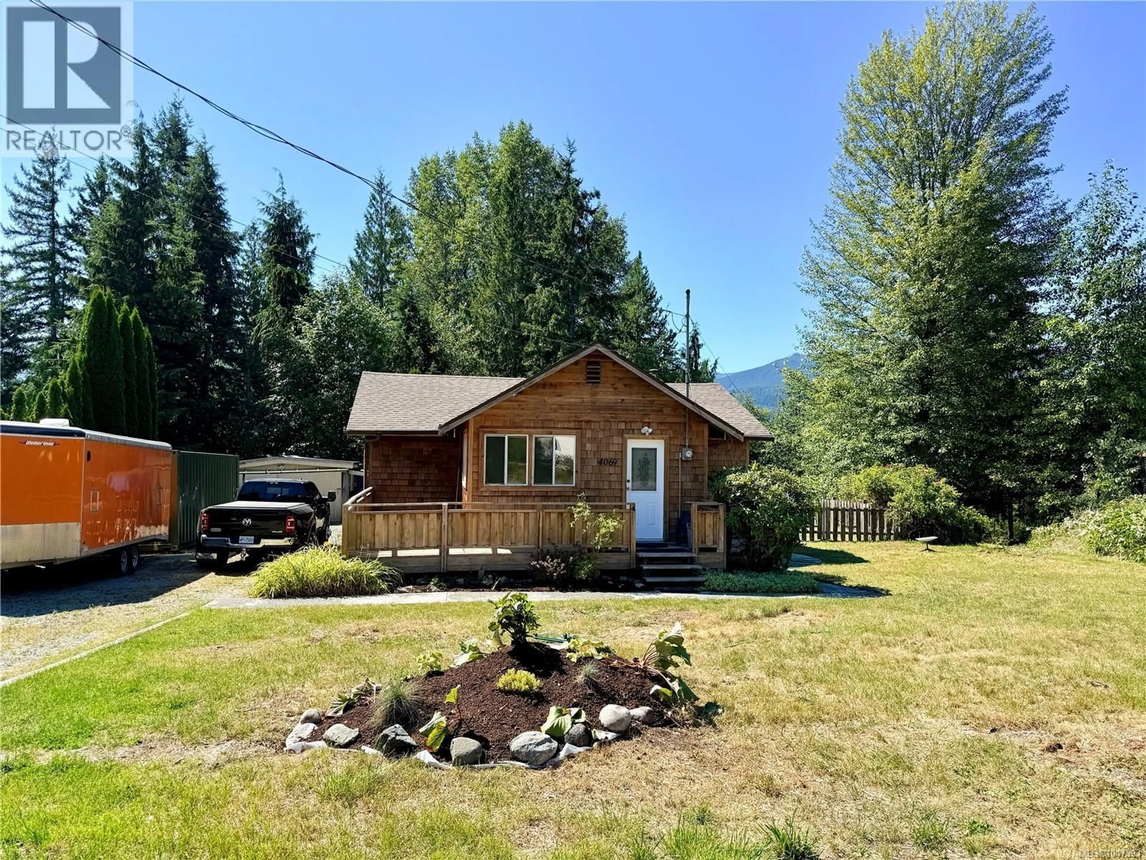 A pic from outside/outdoor area/front of a property/back of a property/a pic from drone, unknown for 4069 NIMPKISH CRESCENT, Woss British Columbia V0N3P0