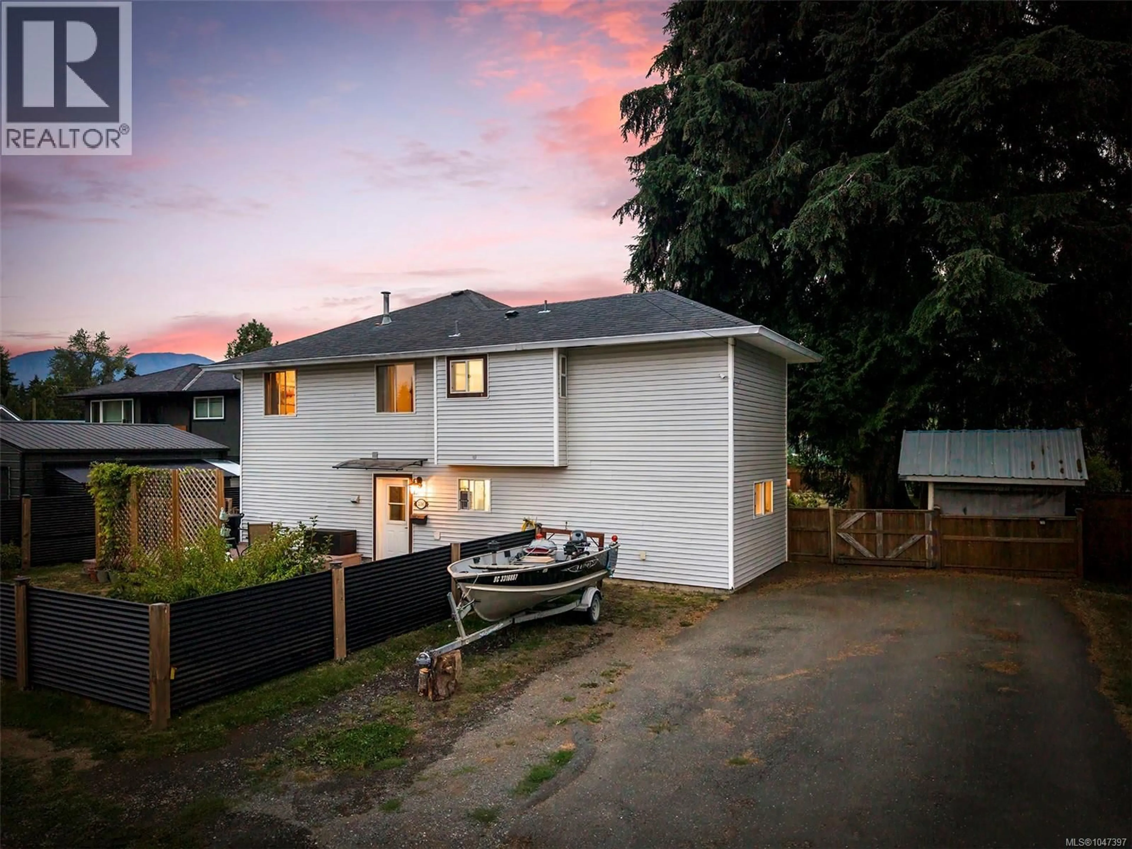 A pic from outside/outdoor area/front of a property/back of a property/a pic from drone, street for 3391 BEVAN ROAD, Cumberland British Columbia V0R1S0