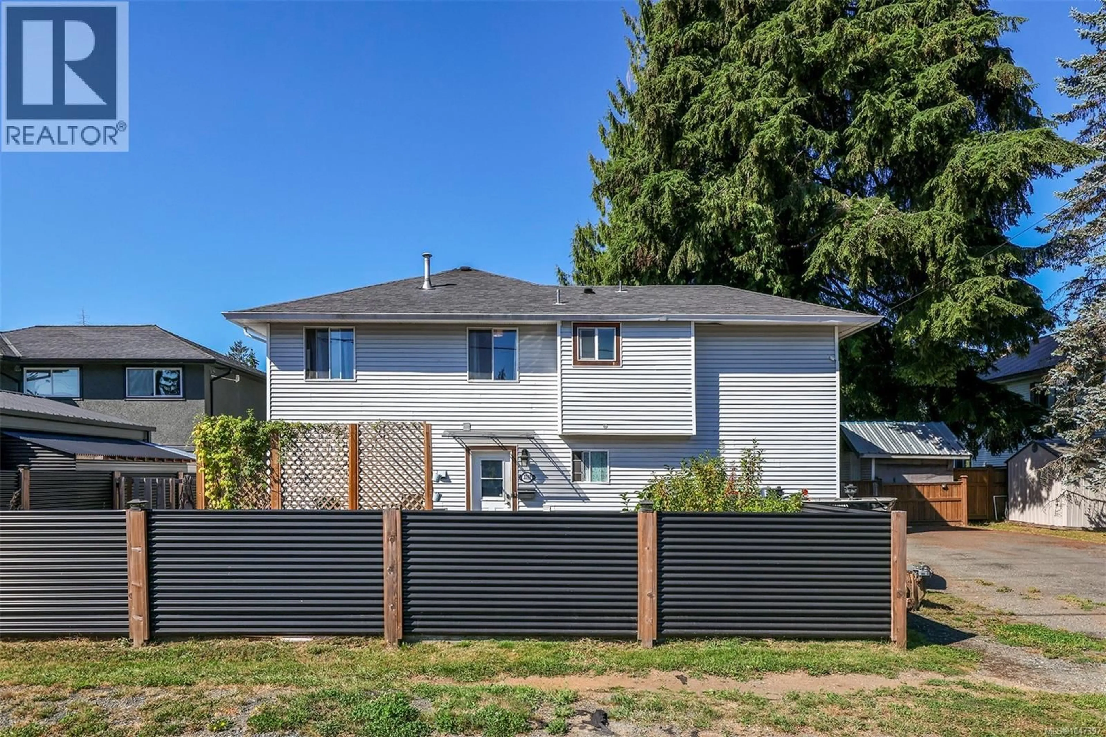 Home with vinyl exterior material, street for 3391 BEVAN ROAD, Cumberland British Columbia V0R1S0