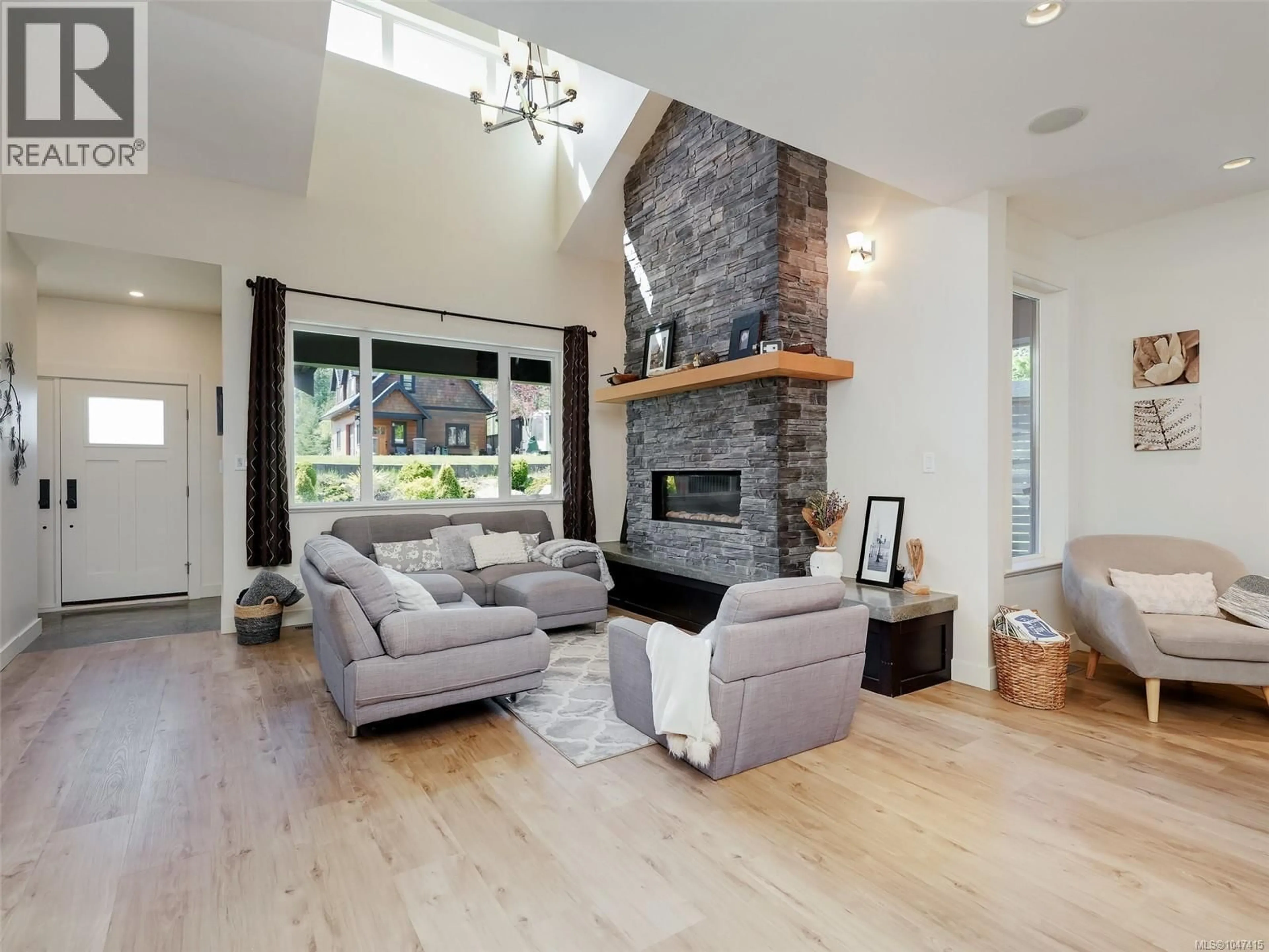 Living room with furniture, unknown for 1865 HIGHLAND RIDGE ROAD, Shawnigan Lake British Columbia V8H2H9
