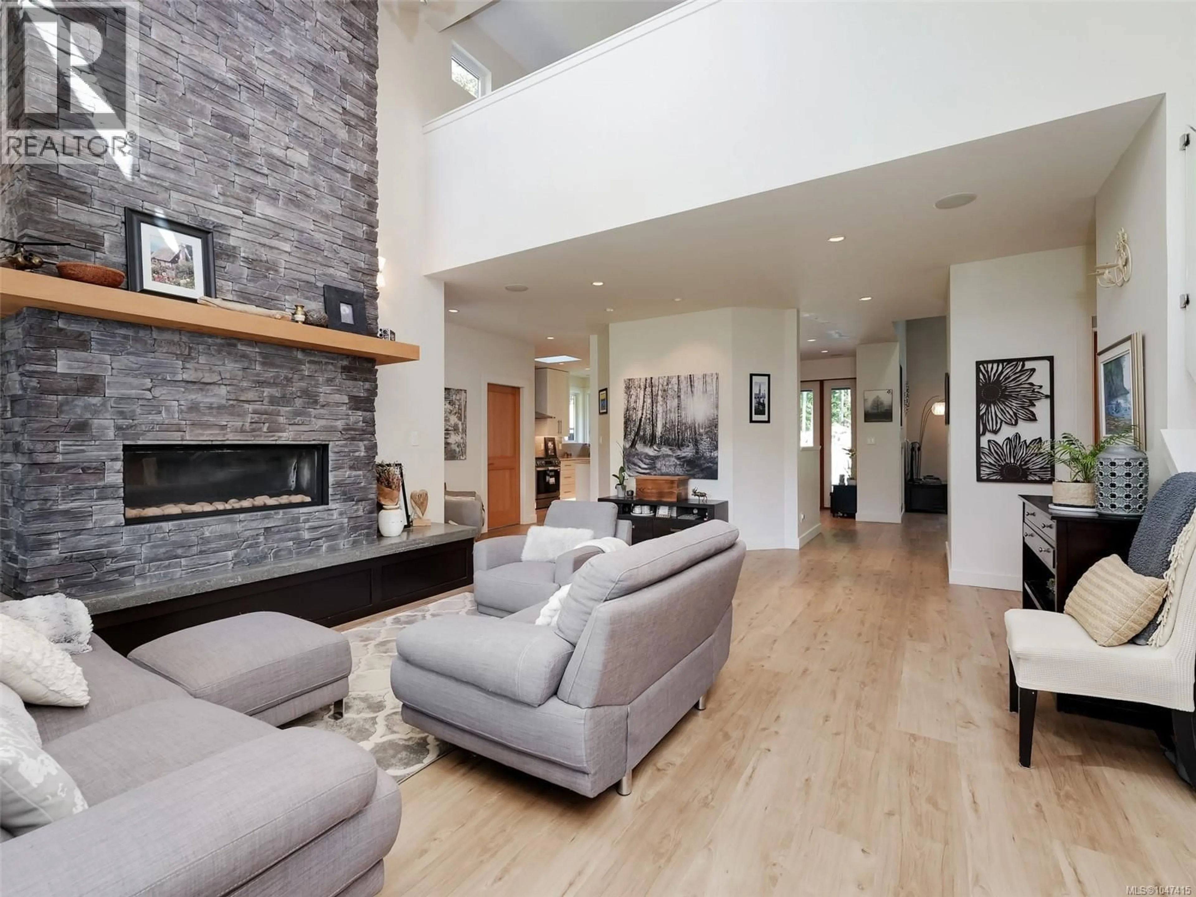 Living room with furniture, unknown for 1865 HIGHLAND RIDGE ROAD, Shawnigan Lake British Columbia V8H2H9
