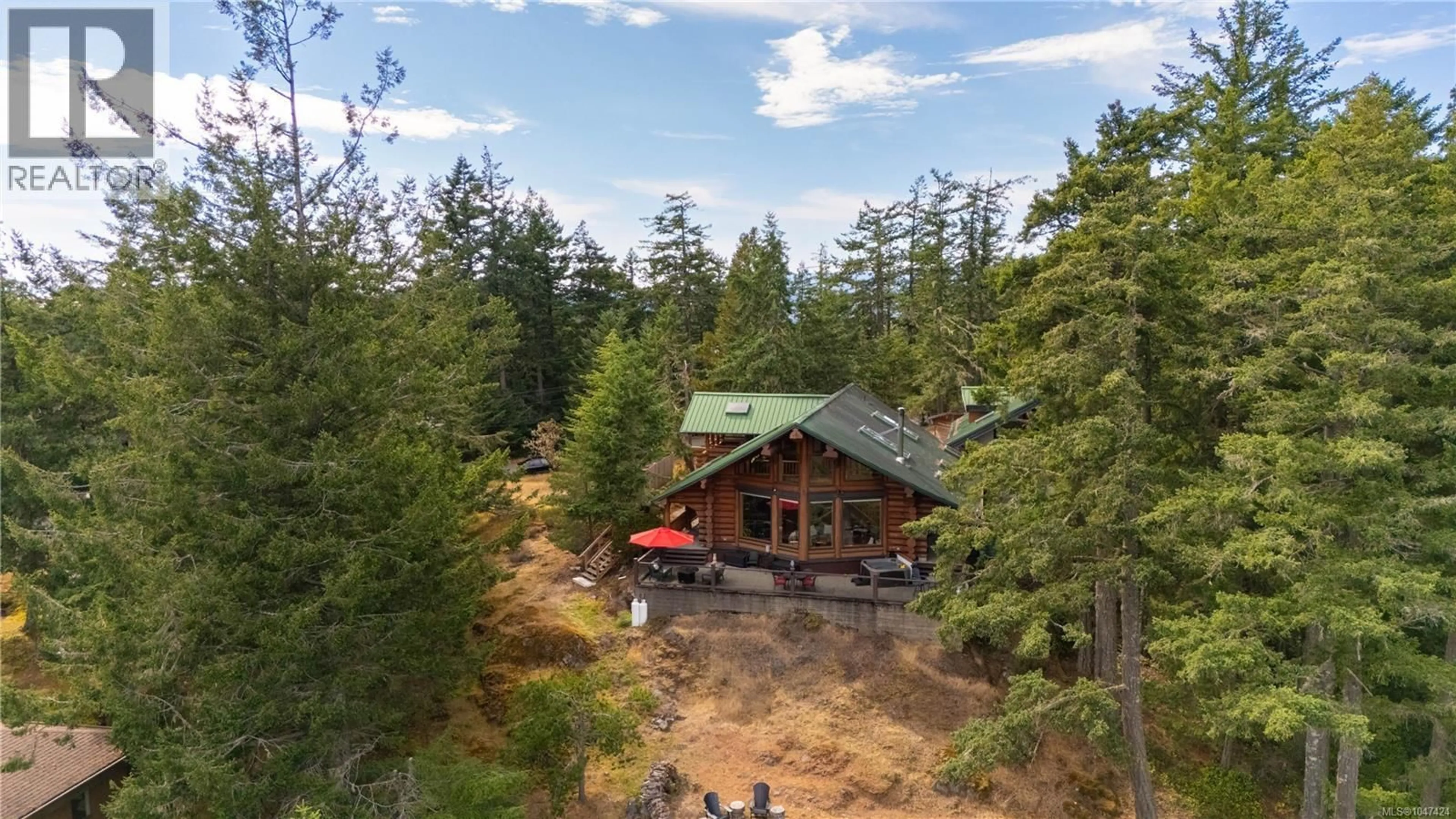 A pic from outside/outdoor area/front of a property/back of a property/a pic from drone, forest/trees view for 661 CAINS WAY, Sooke British Columbia V9Z1C6