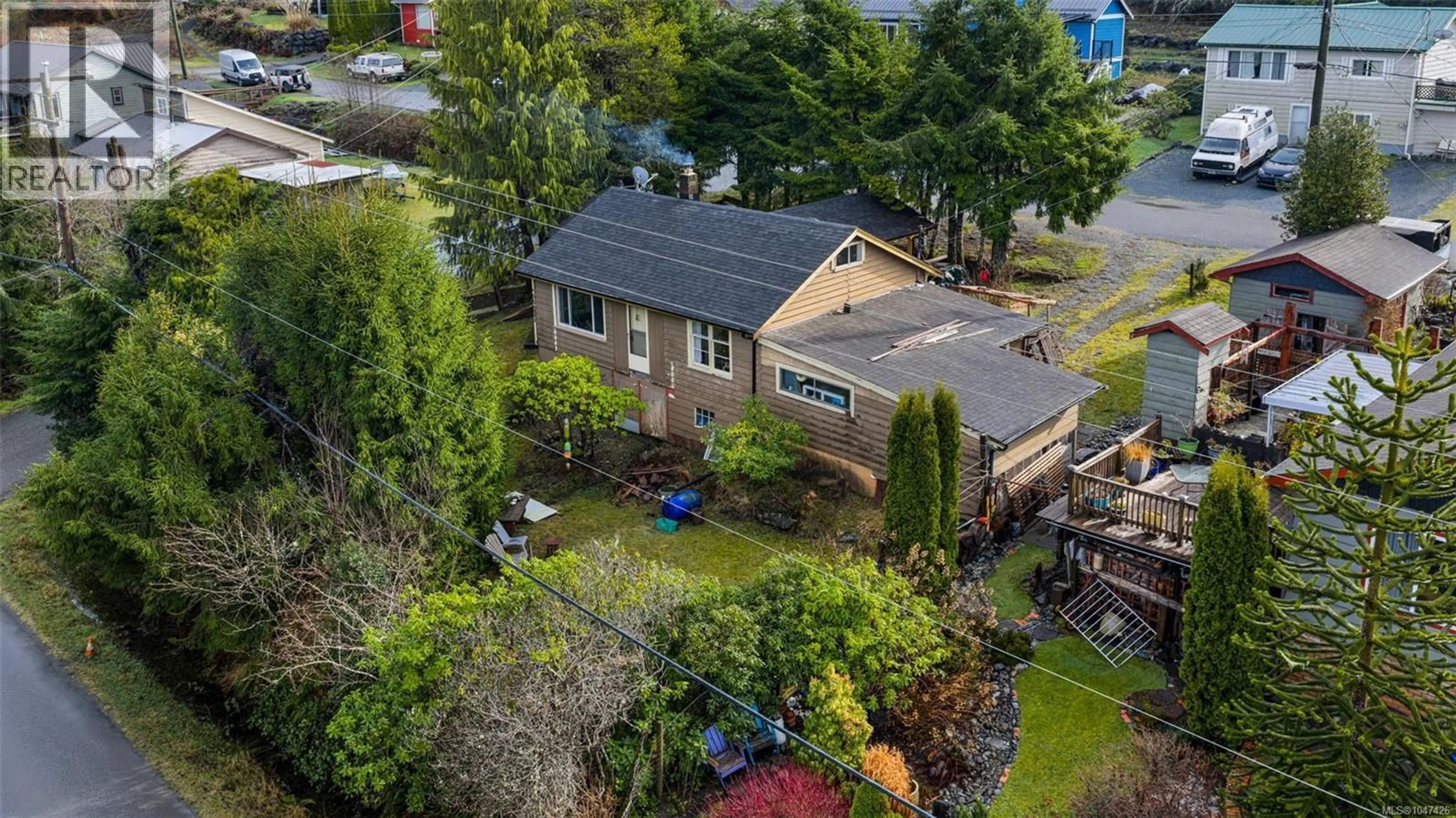 A pic from outside/outdoor area/front of a property/back of a property/a pic from drone, street for 17002 WICKANNINISH ROAD, Port Renfrew British Columbia V0S1K0
