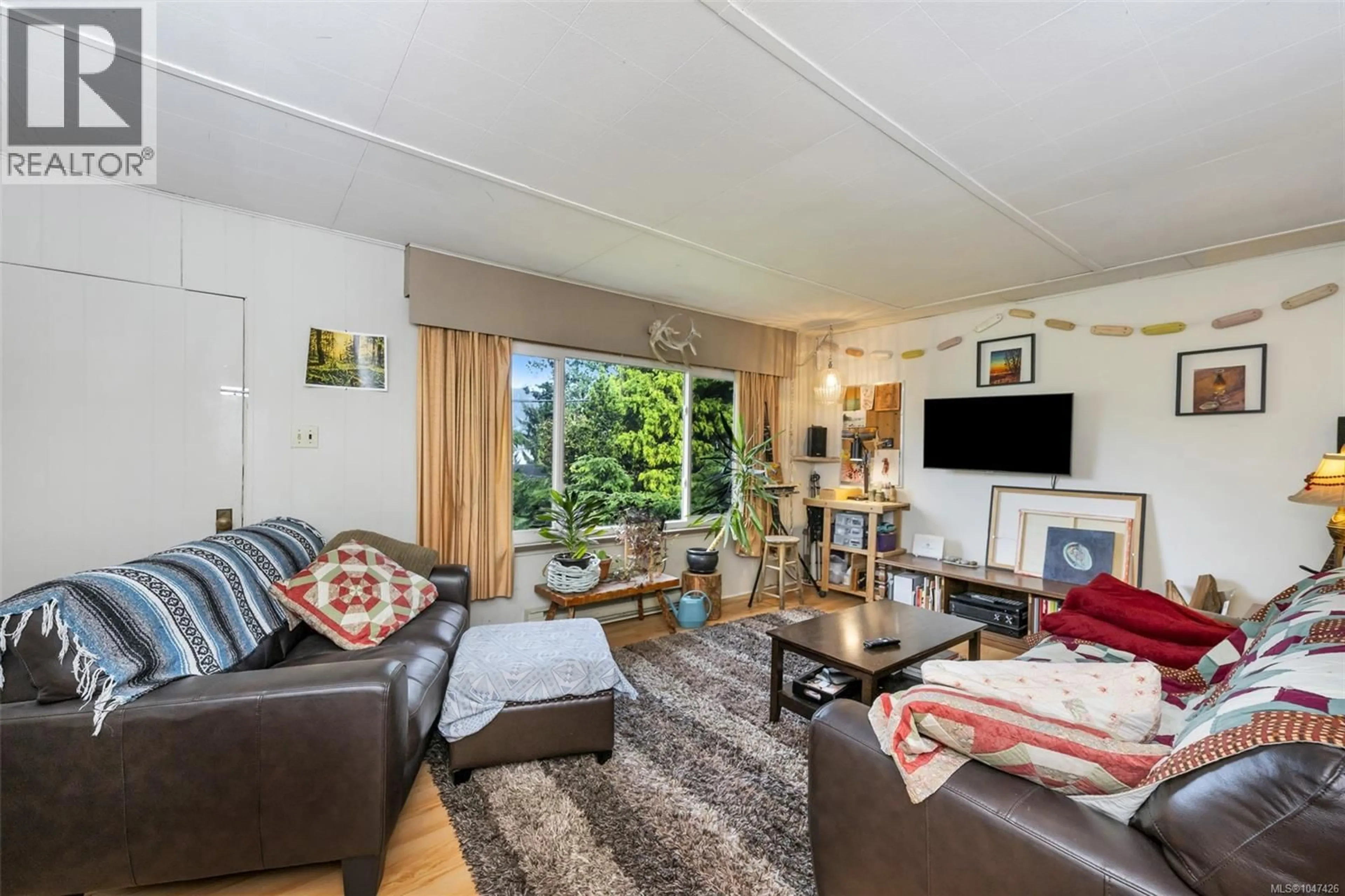 Living room with furniture, unknown for 17002 WICKANNINISH ROAD, Port Renfrew British Columbia V0S1K0
